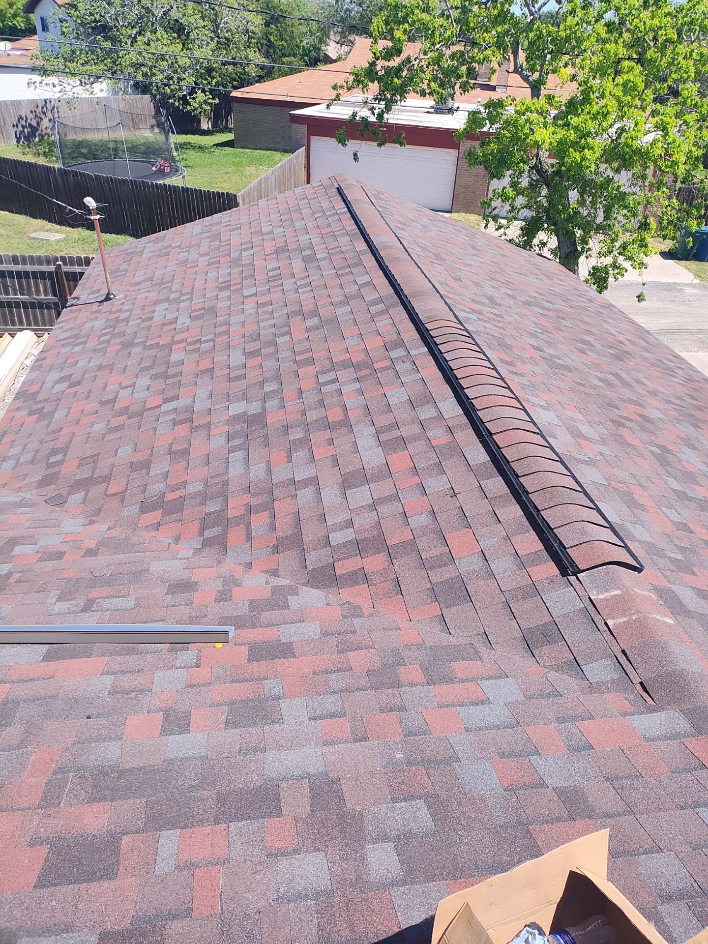She looks good in Red by Bayfront Roofing and Construction