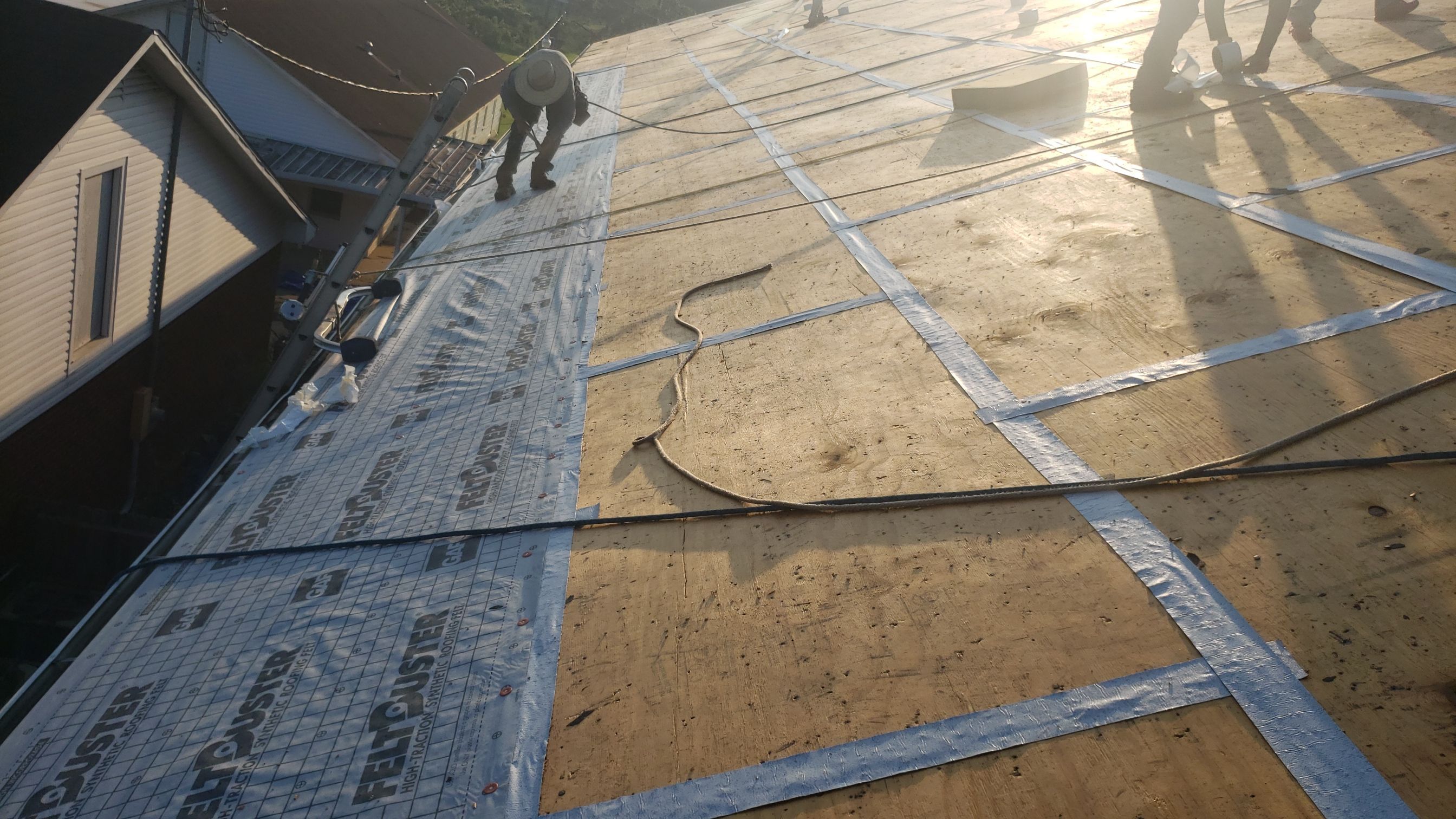 Residential Roofing Installation using Roof Replacement by American Roofing & Construction LLC