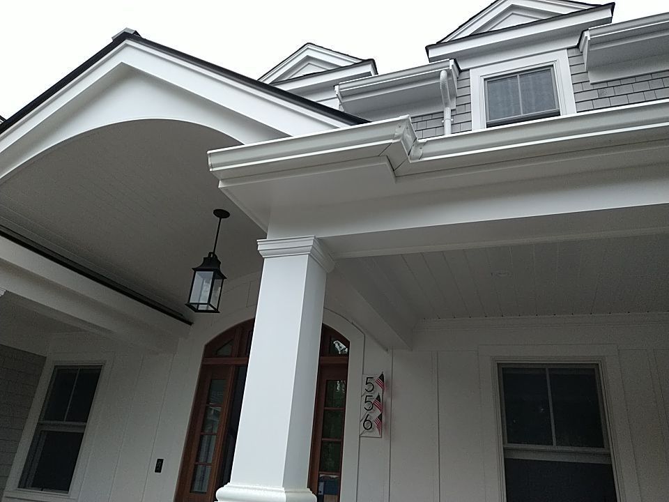 K-Style Gutter Installation with Round Downspouts in Marshfield, MA by Gutter Pro Enterprises