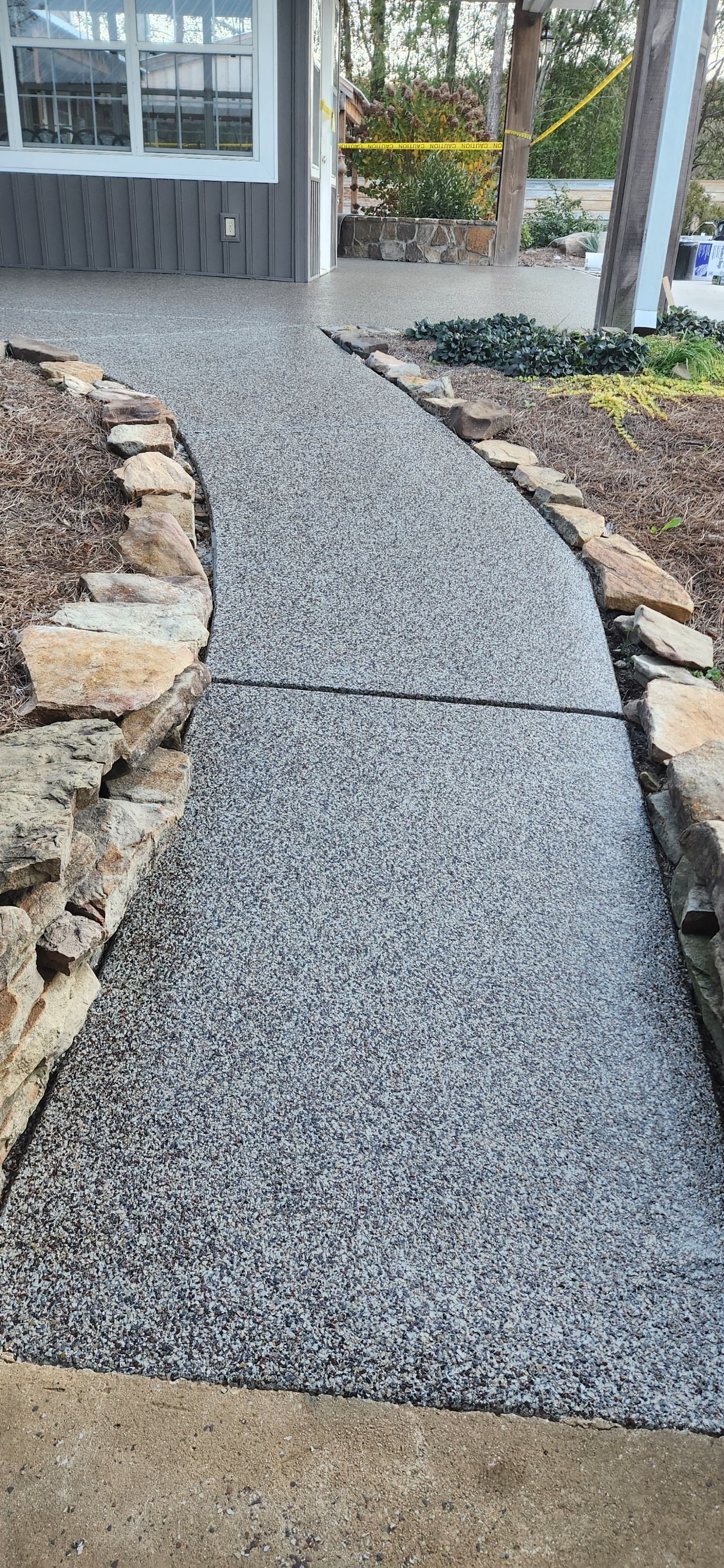 Porch, Garage, & Sidewalk using Custom Creekbed Blend by Elite Floor Solutions