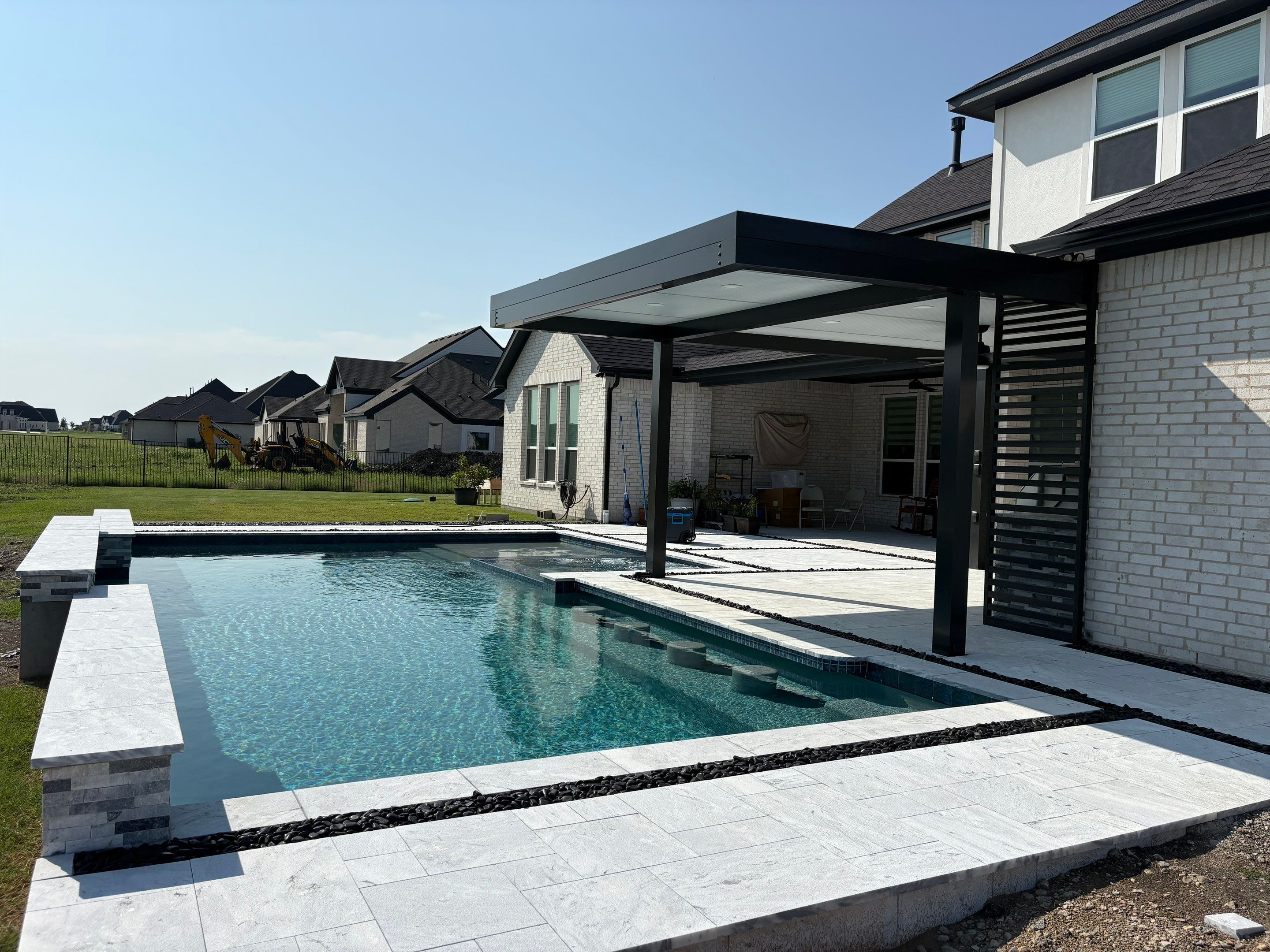 Modern Pool with Inline Spa and LED Lighting by Pinnacle Pools and Spas - DFW