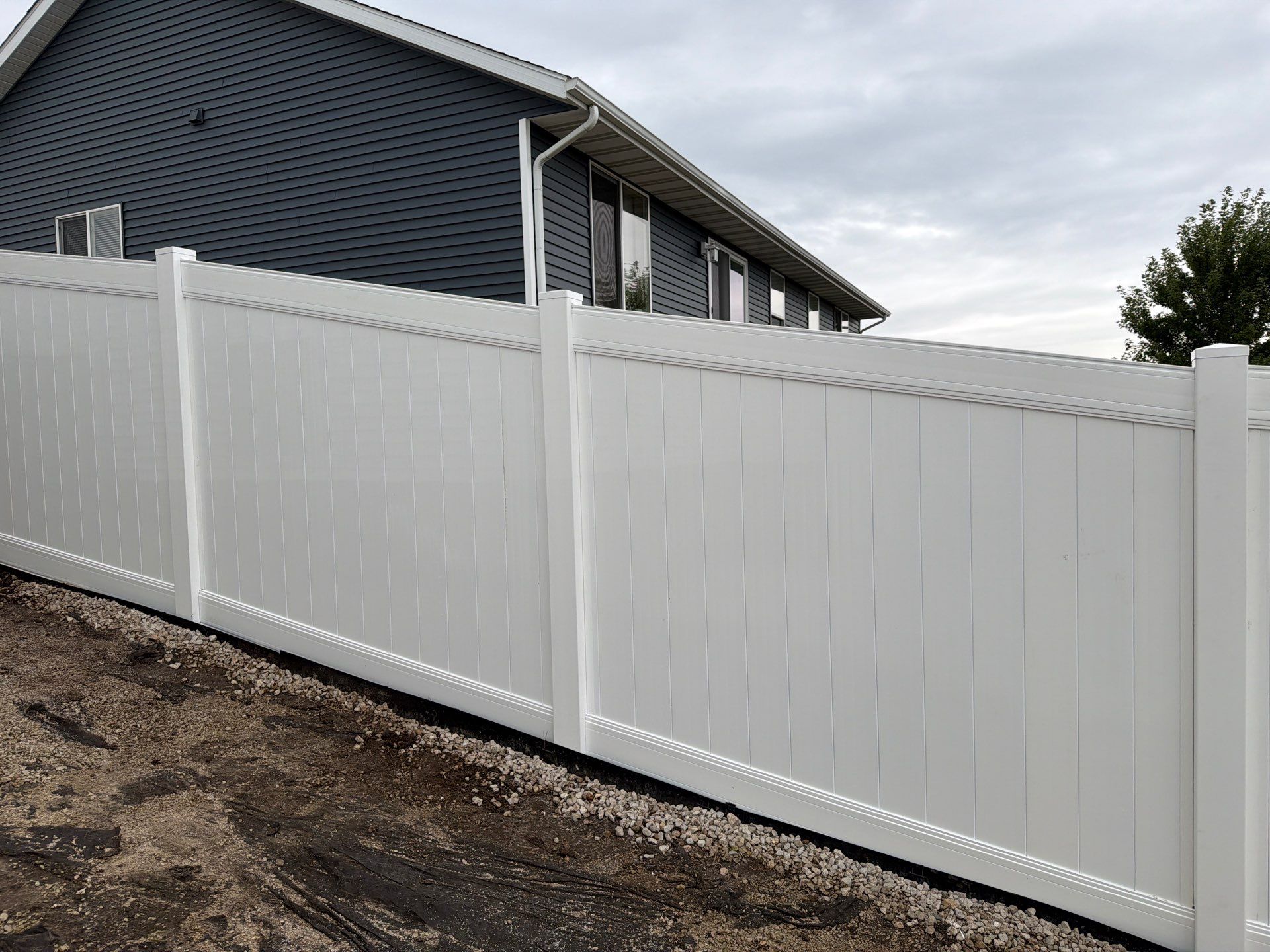 Residential Vinyl Privacy Fence Installation in Urbana by Perfect Picket Fence and Stain
