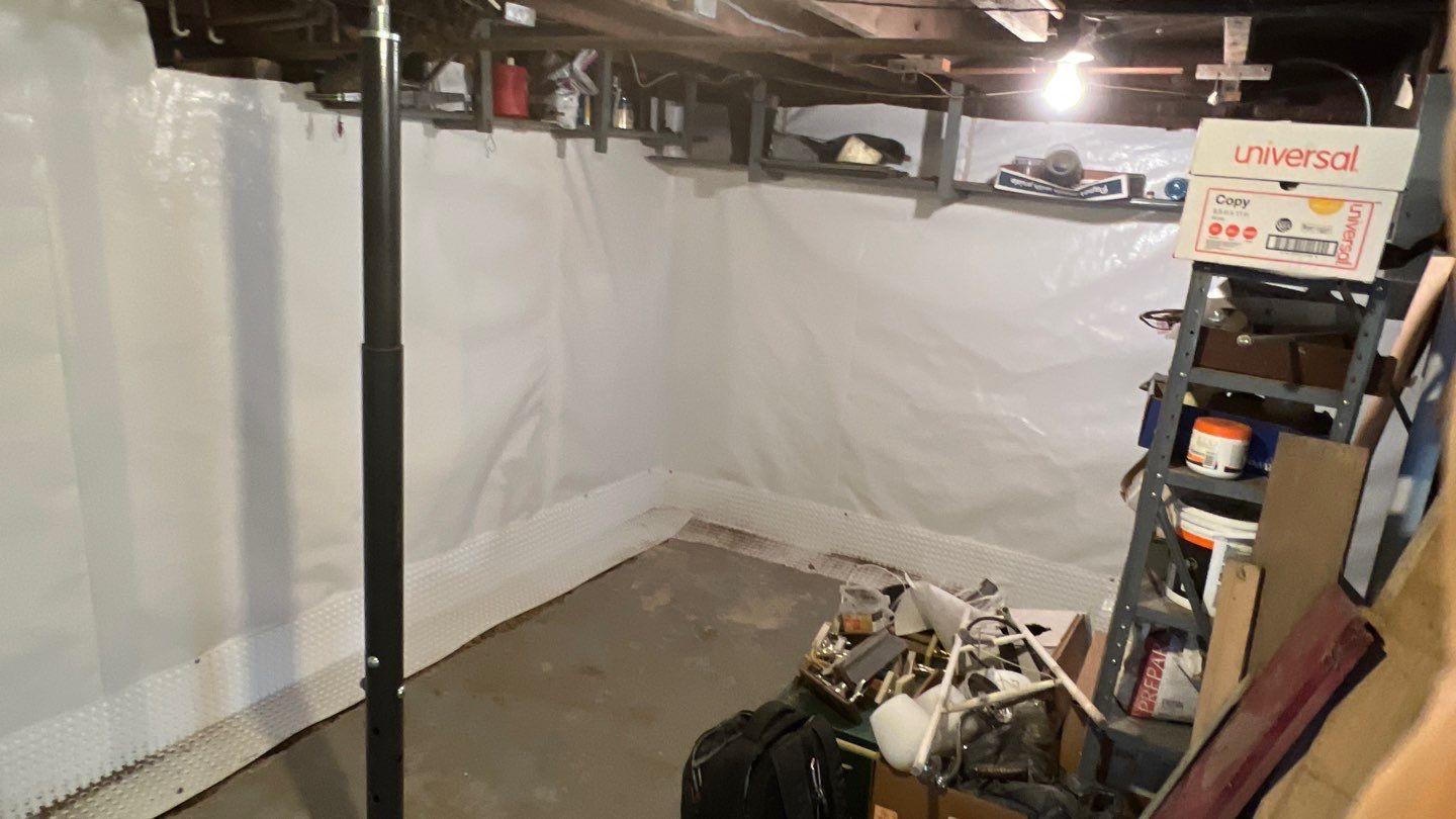 Basement Waterproofing using Drain tile system and a foundation wrap by ACE Waterproofing & Basement Solutions