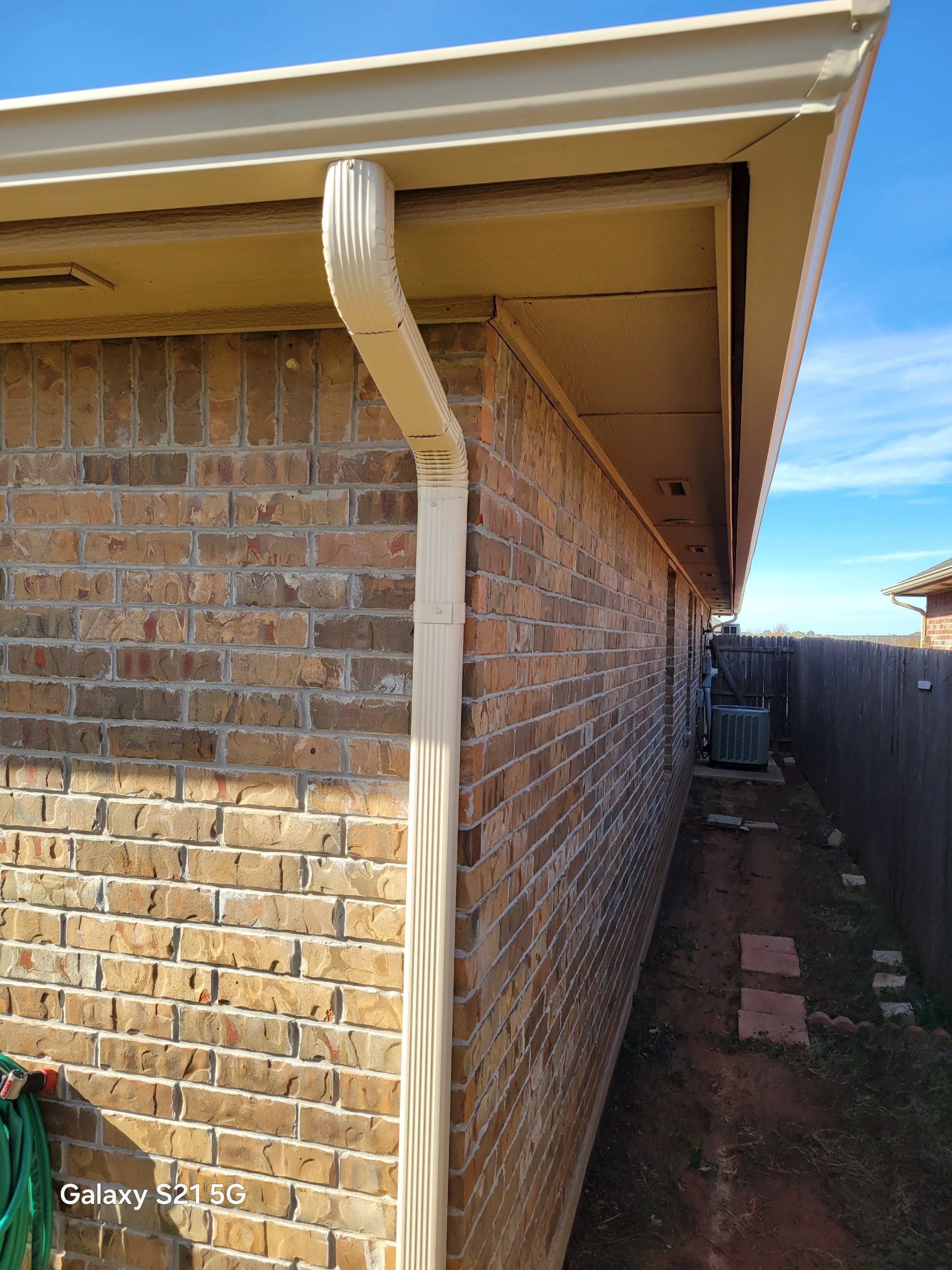 roof replacement & gutter installation in Edmond by McCann's Roofing and Construction