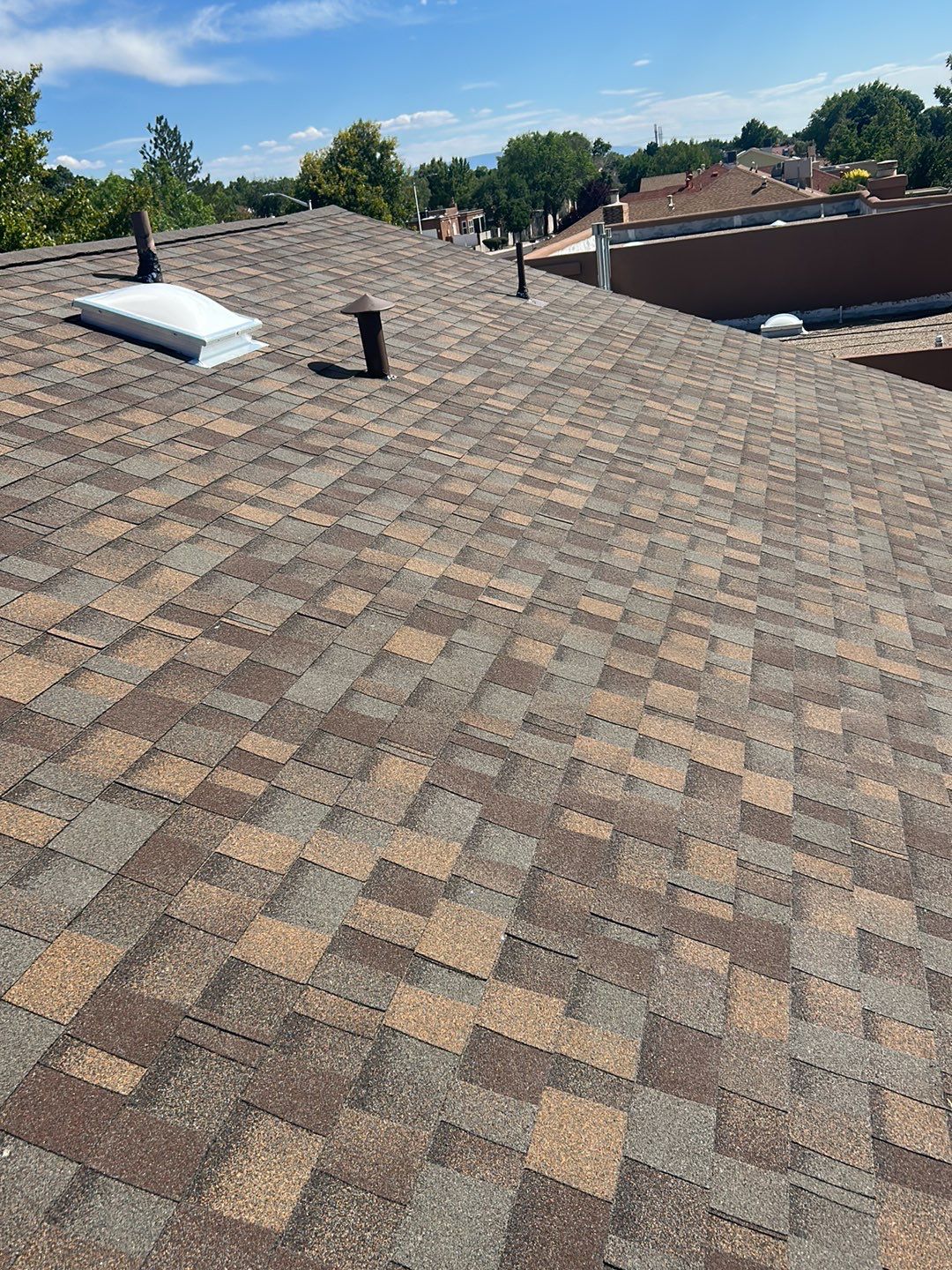 Brownwood Shingles by Reimagine Roofing