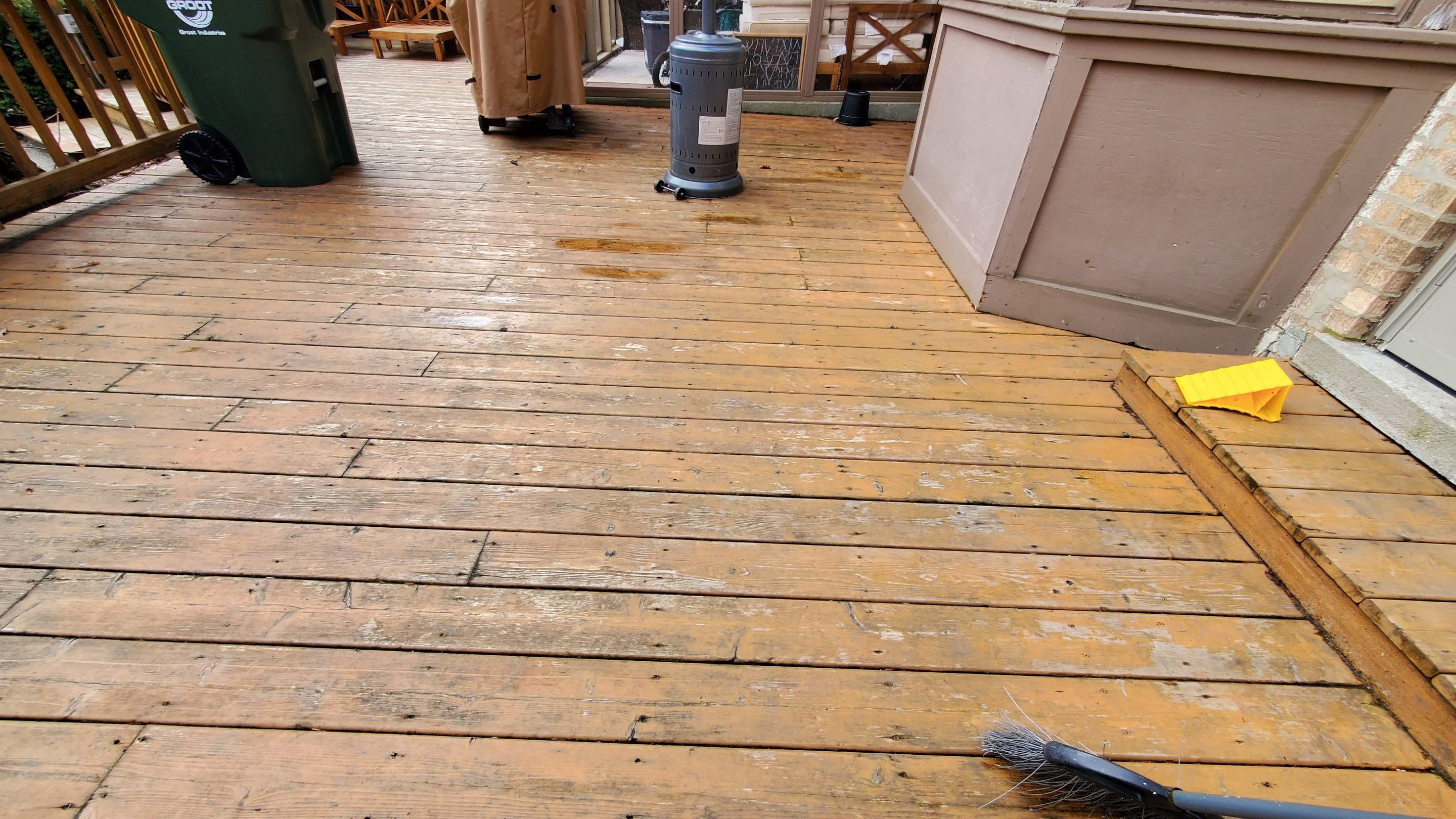 Wood cleaning and staining using Armstrong cloark oil stain by Northern Power Washing LLC.