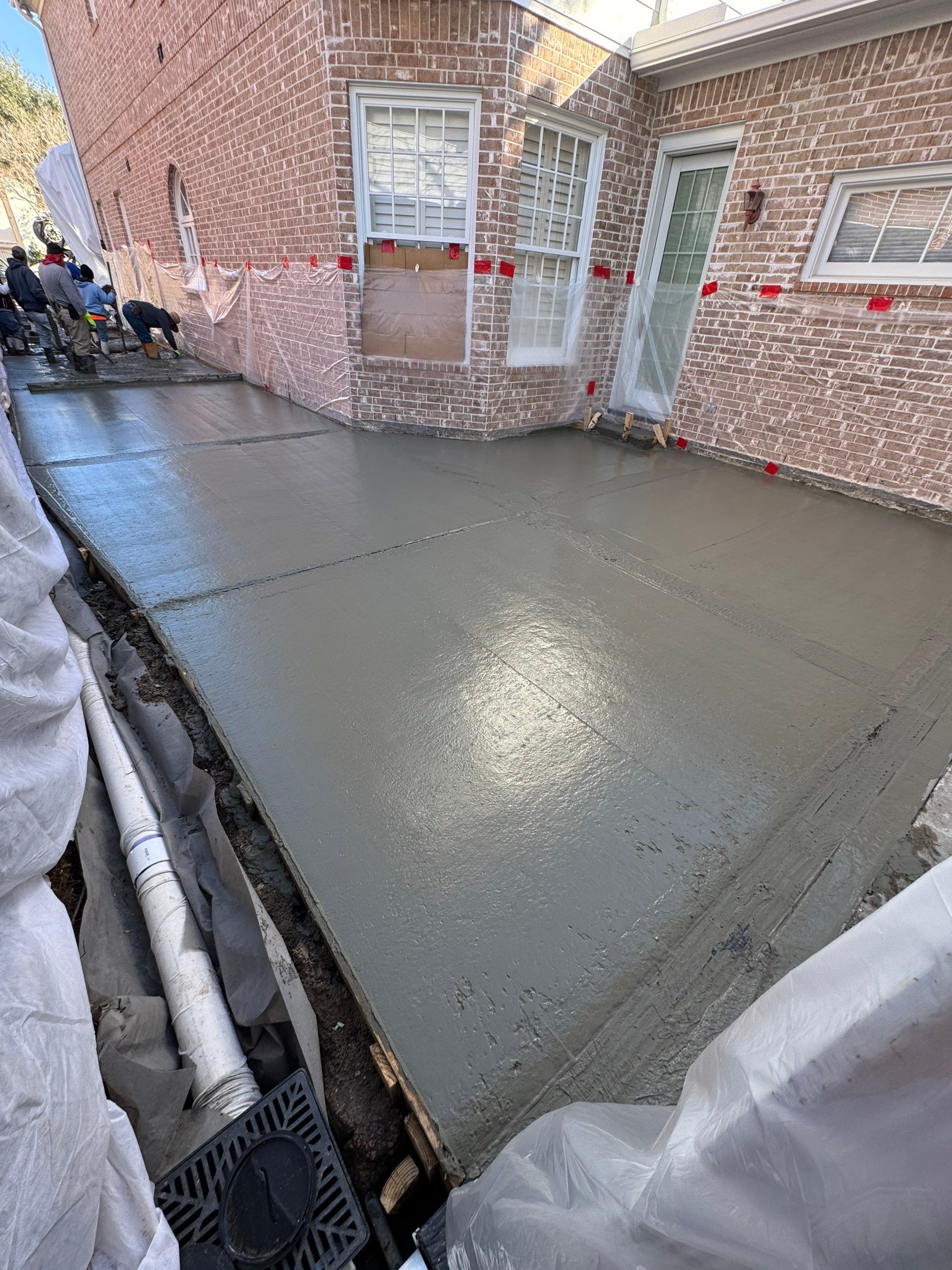 Driveway Concrete Replacement & French Drainage System by Texas Urban Elements