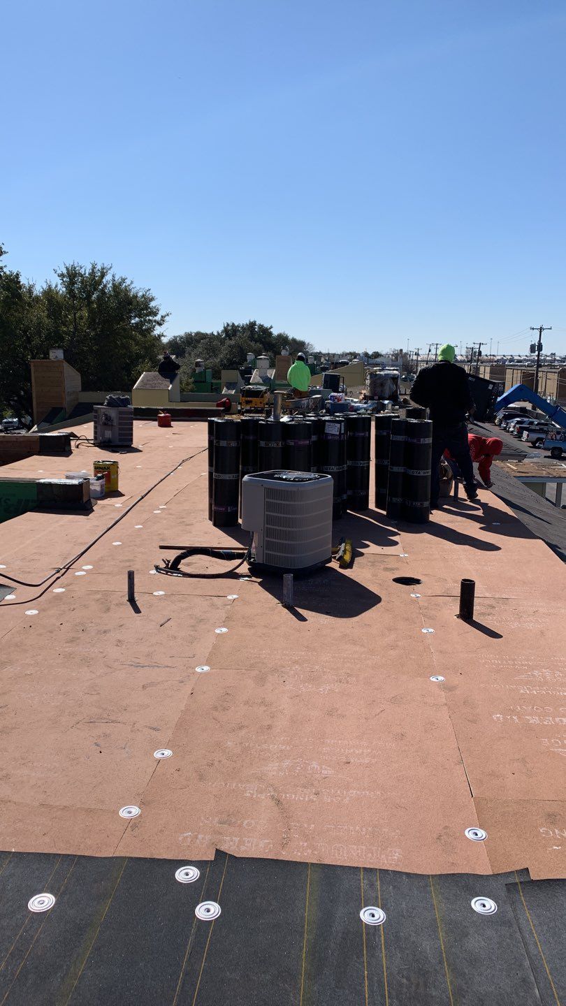 Apartment Roof Replacement by First Out Roofing 