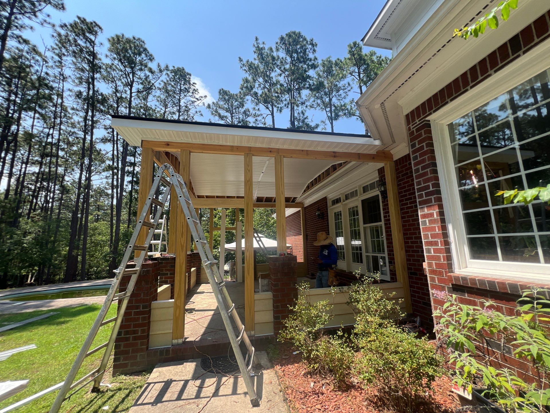 Custom Screened-In Porch Addition with Open Gable Roof in Fayetteville by The Remodeling Company