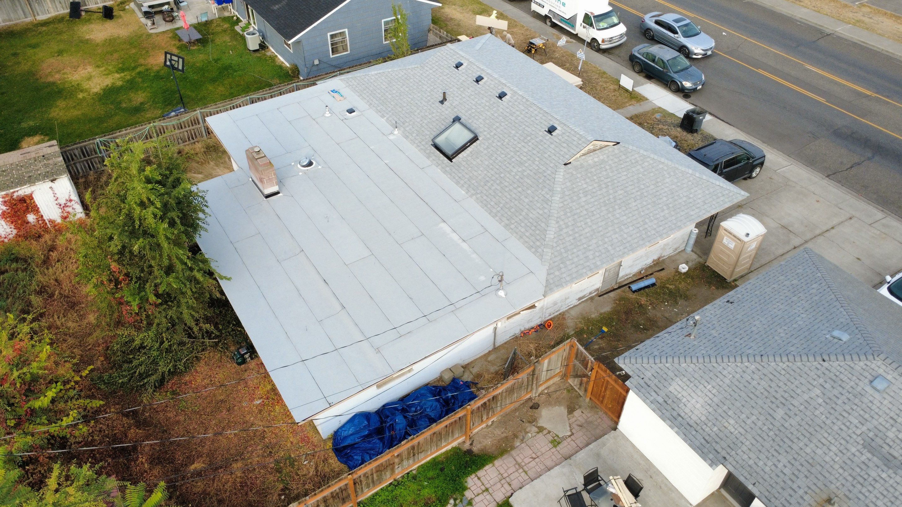 Residential Shingle and Flat Roof Replacement with Fascia Restoration in Kennewick by Alpine Roofing