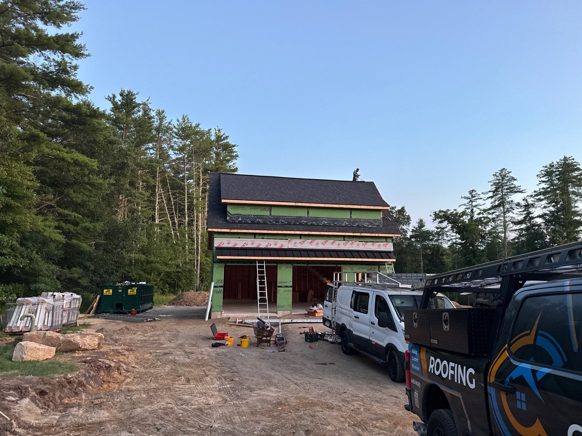 Merrimack NH ADU Roof Installation with Owens Corning Onyx Black Shingles and Standing Seam Metal Accents by Compass exteriors