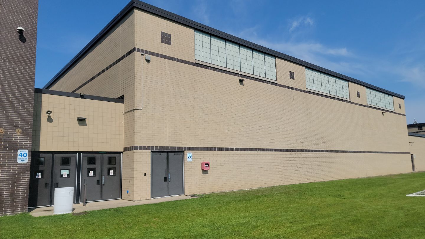 commercial pressure washing using Algaecide, soft wash soap by Northern Power Washing LLC.