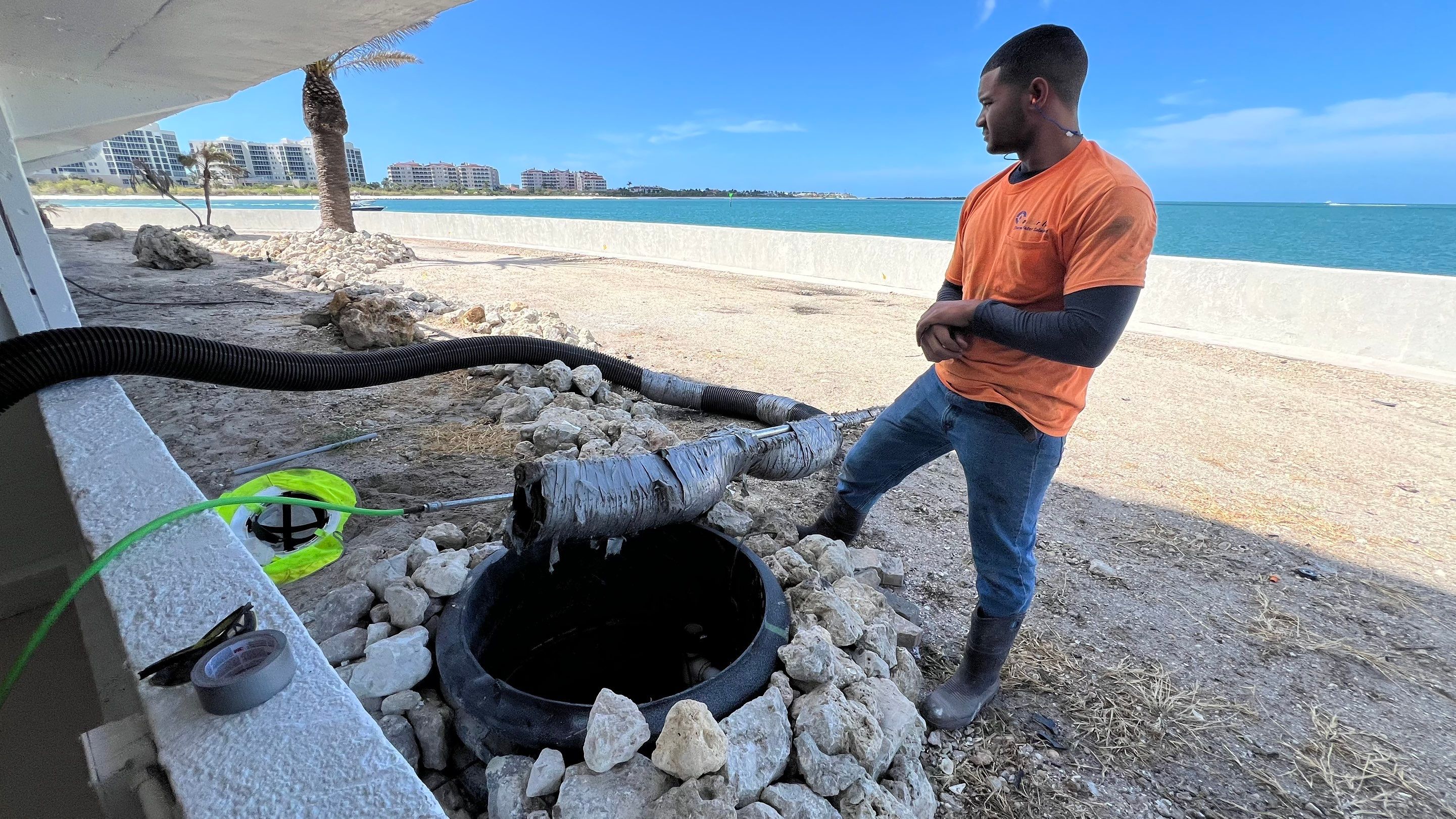Isles of Capri Condo Parking Garage Drainage System Cleaning by APS Power & Water