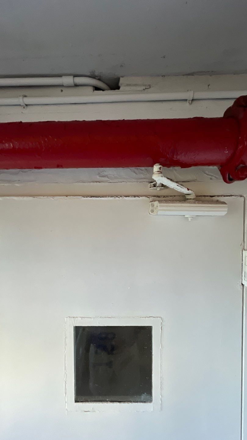 Commercial Stairwell Door Replacement & Hollow Metal Door Retrofit – Pompano Beach High-Rise by The Door Doctor of South Florida, Inc.