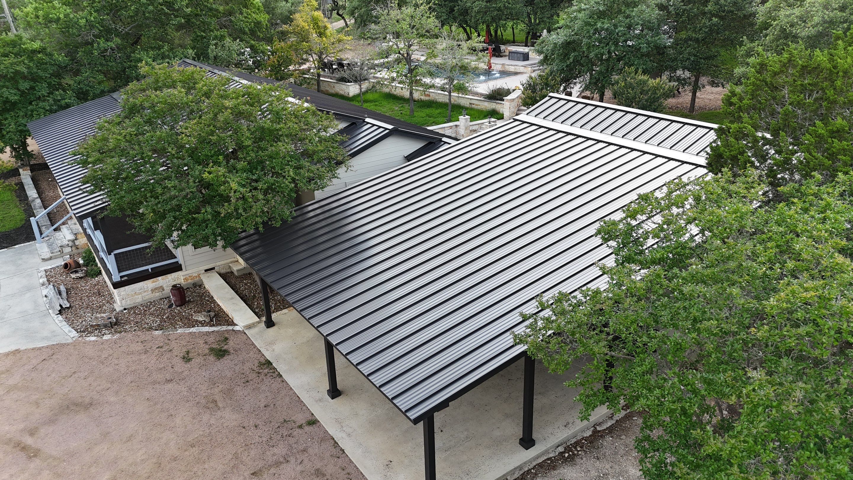 Dark Bronze Fully Striated panel by Wimberley Roofing
