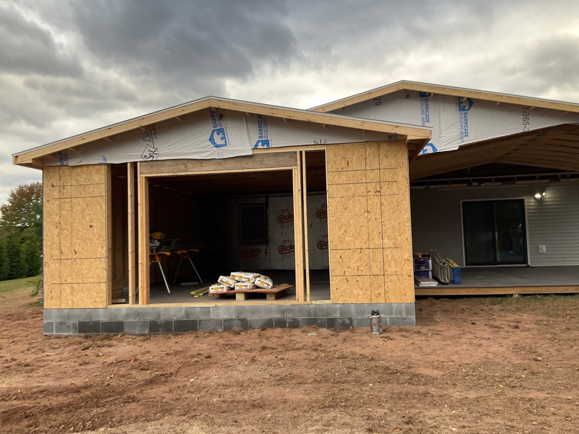 Residential Addition and Covered Porch Roof  by Esh Builders