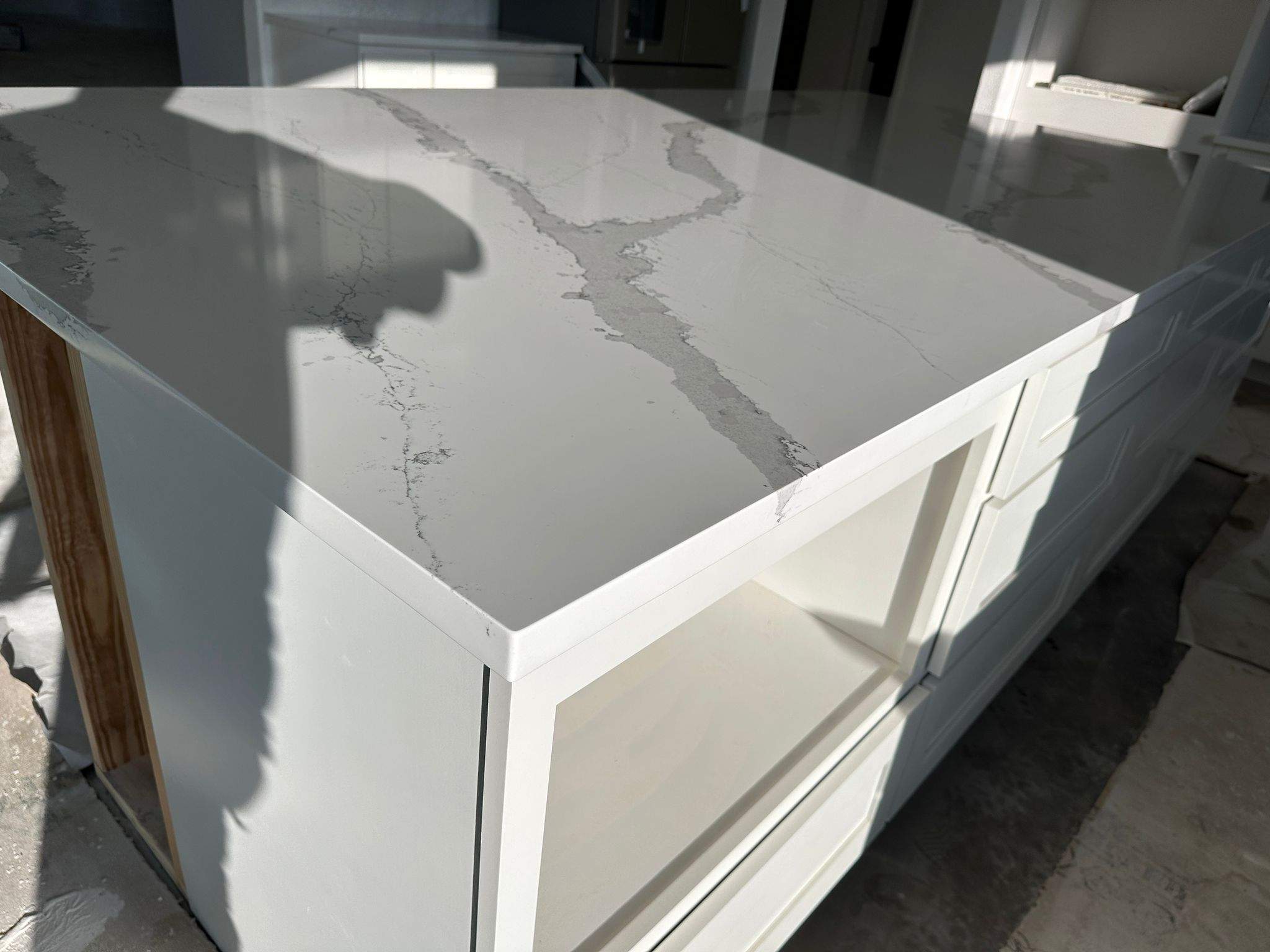 Kitchen and Bathroom Countertop Upgrades Featuring Gray Veined Quartz by Mena stone surfaces