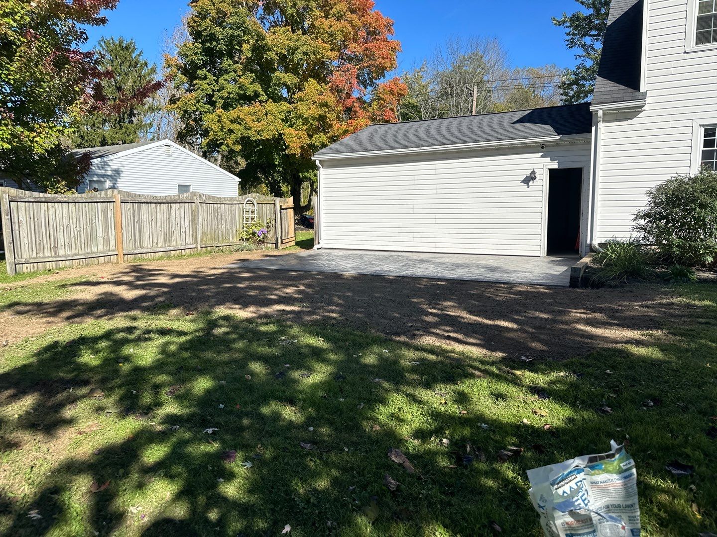 Majestic Ashlar stamped concrete patio with a border  by NG Masonry & Construction LLC