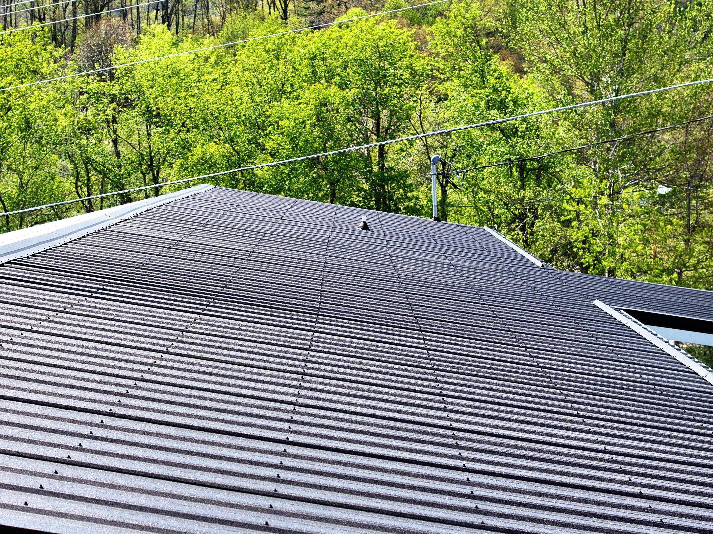Textured Black AG Panel by Omnia Roofing