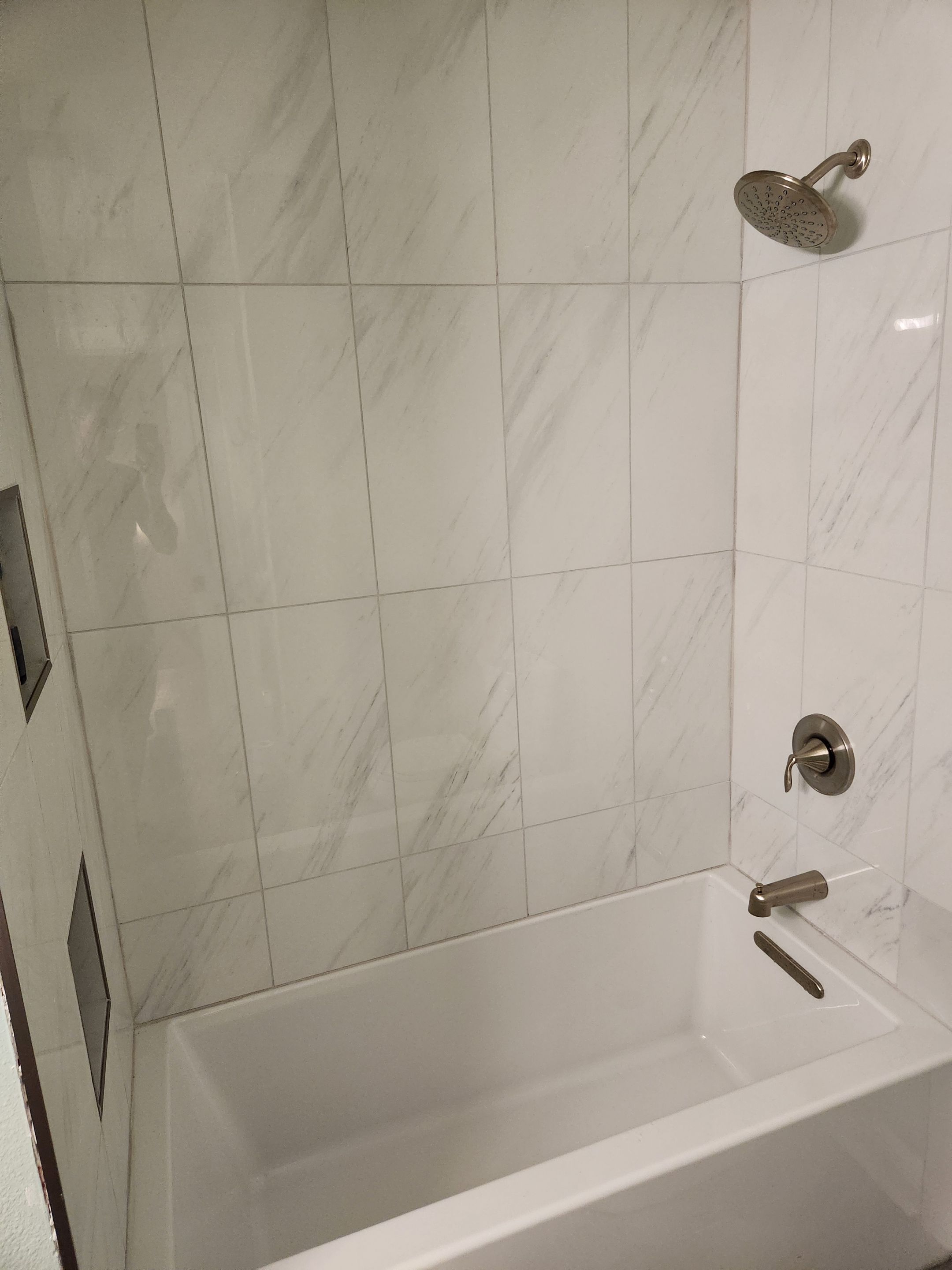 Austin Bathroom 2 and a half Remodel Featuring Tile and Custom Niches by RejuveNate Renovations LLC