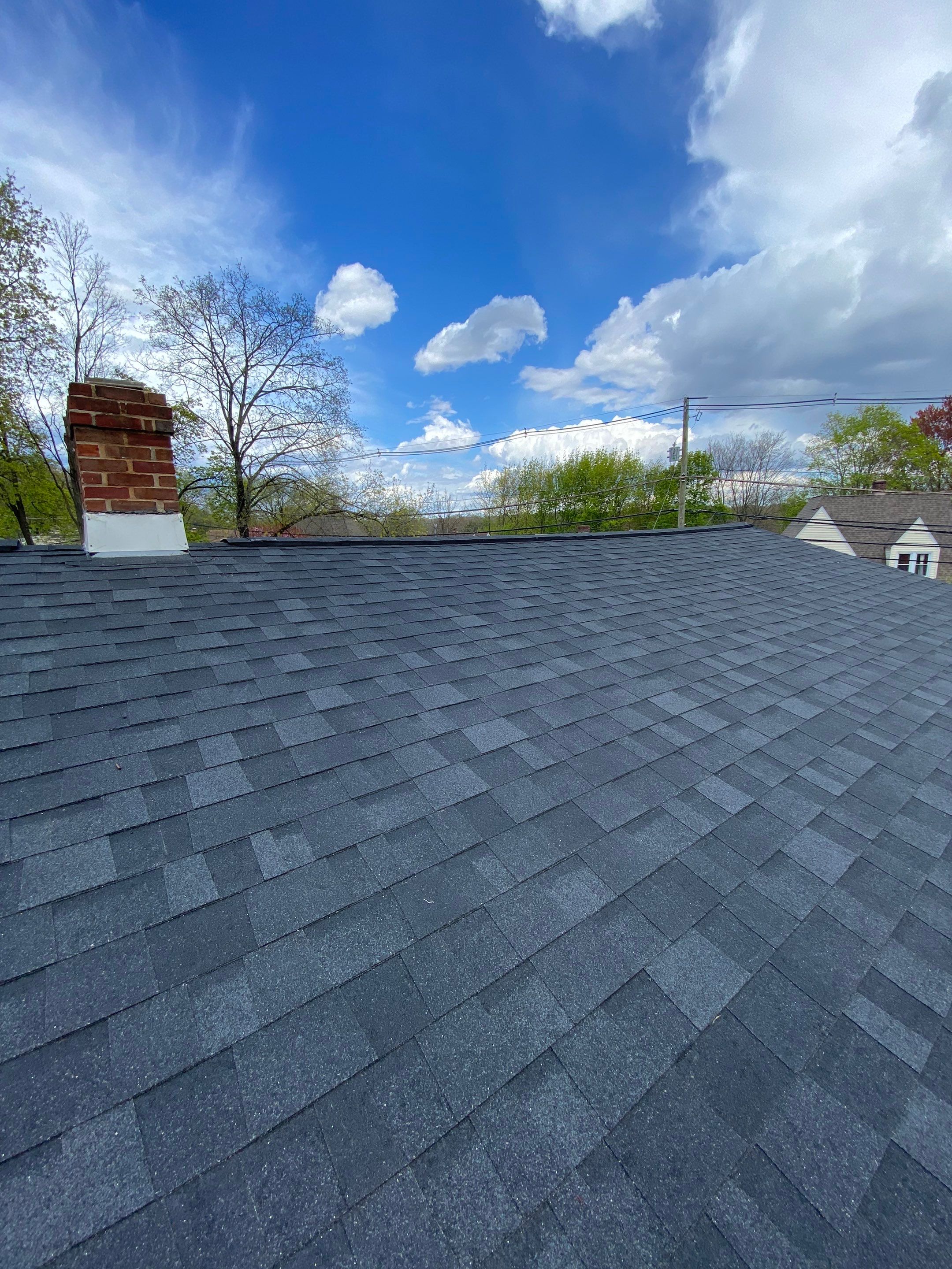 Charcoal Shingles by Reimagine Roofing