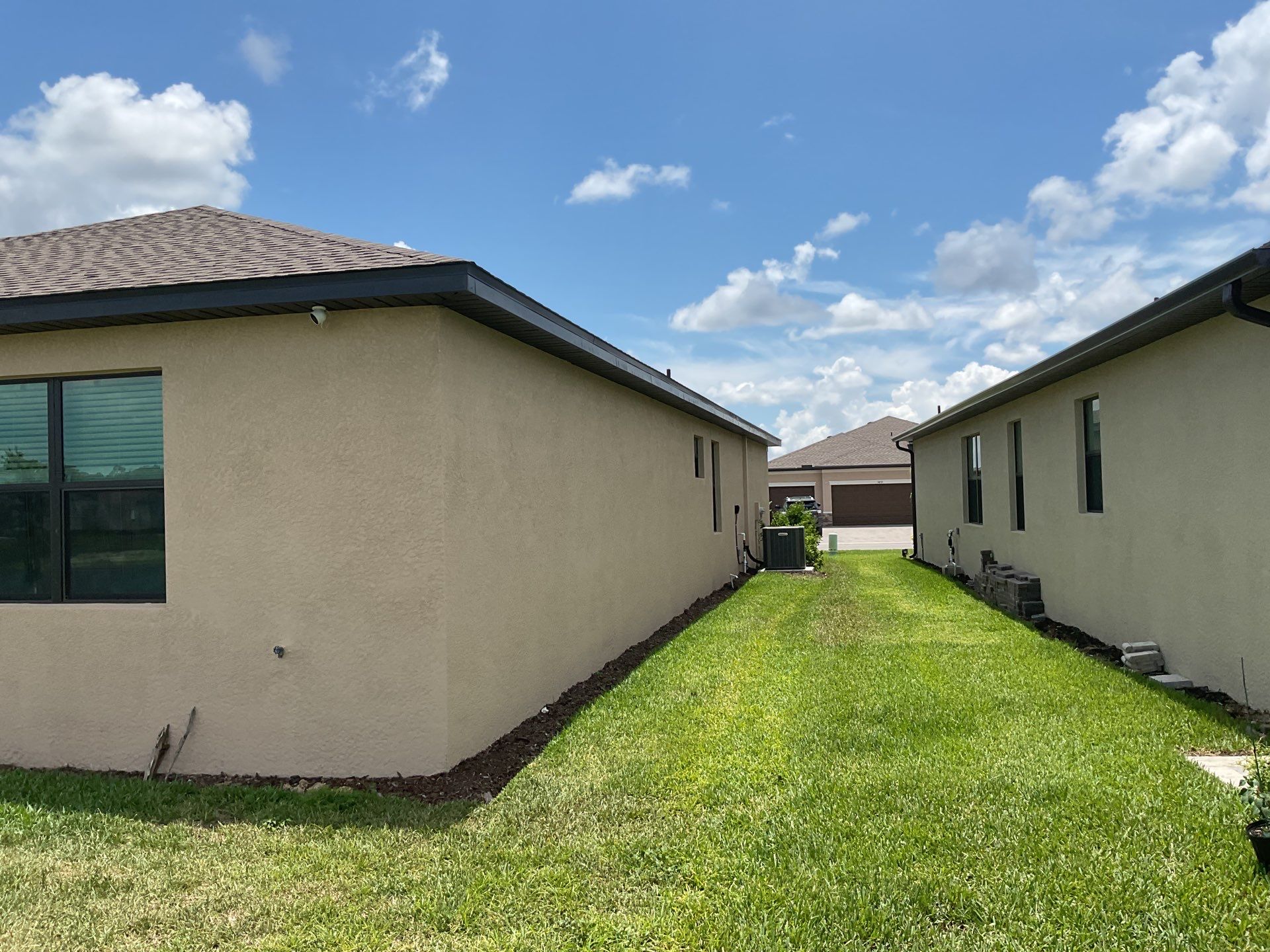 Brown Seamless Gutters for Homes in Fort Myers by Gutter Professors