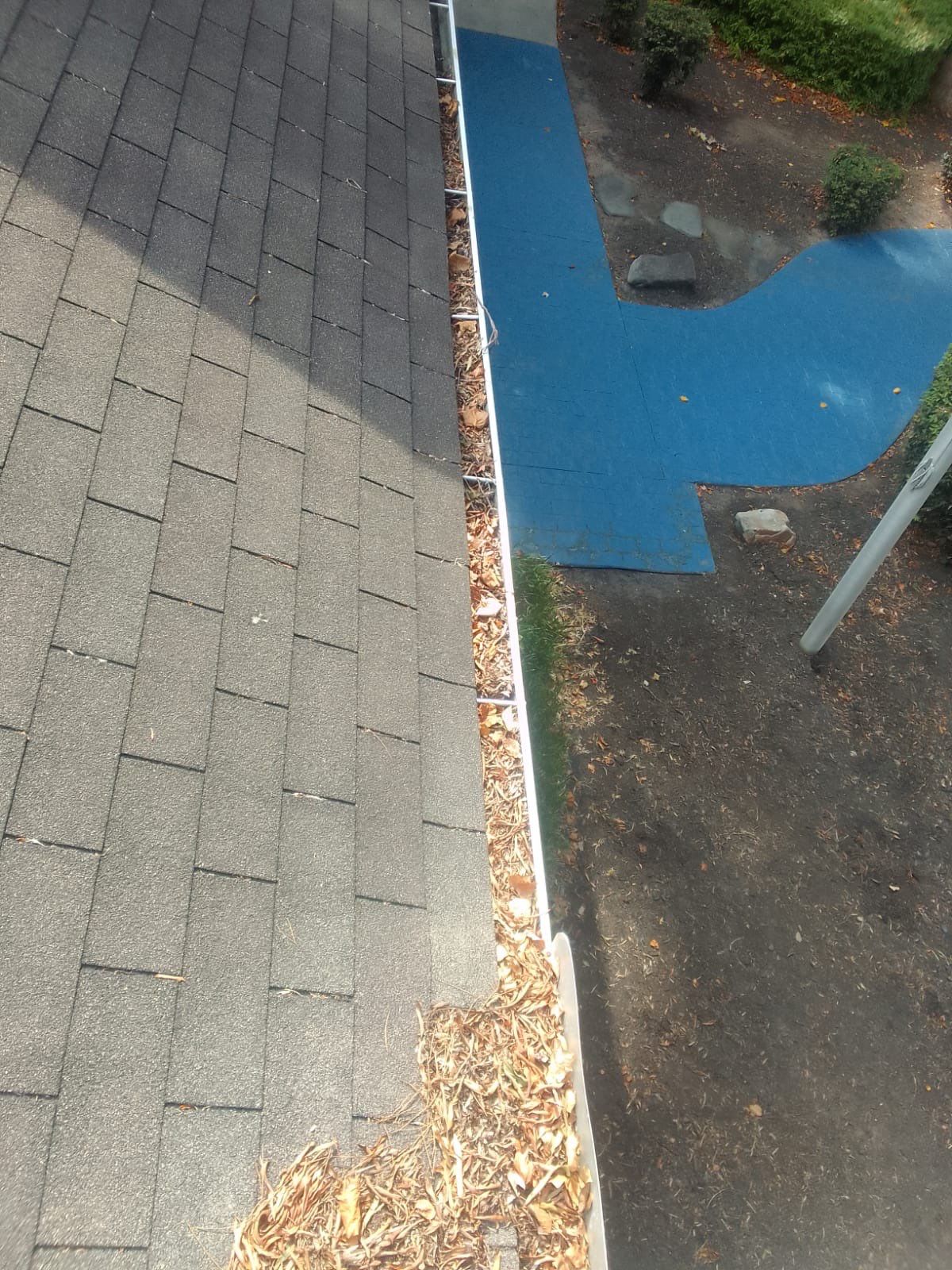 Commercial gutter cleaning Wake Forest & Rolesville, NC before photo with filled gutters