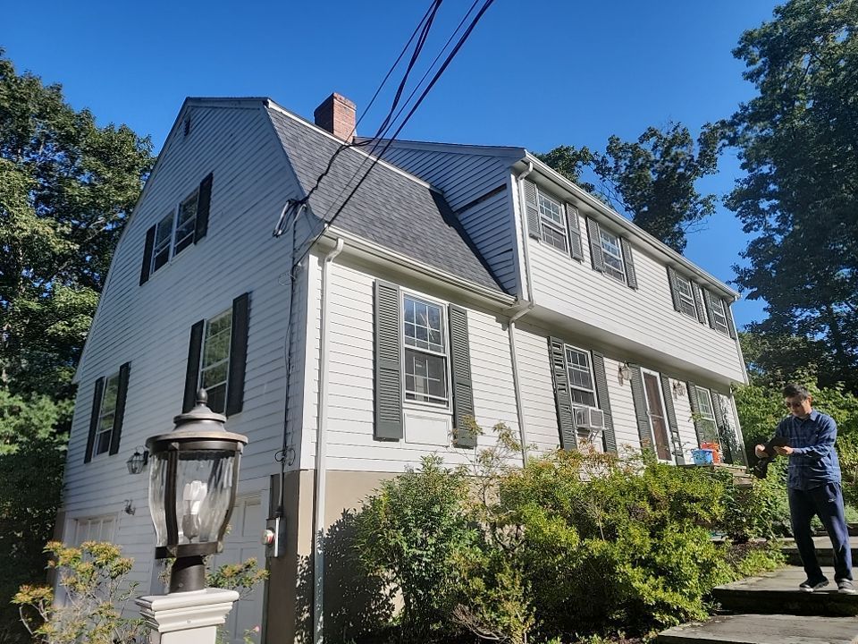 Custom window trim work and siding replacement in Dover, MA by UBrothers Construction