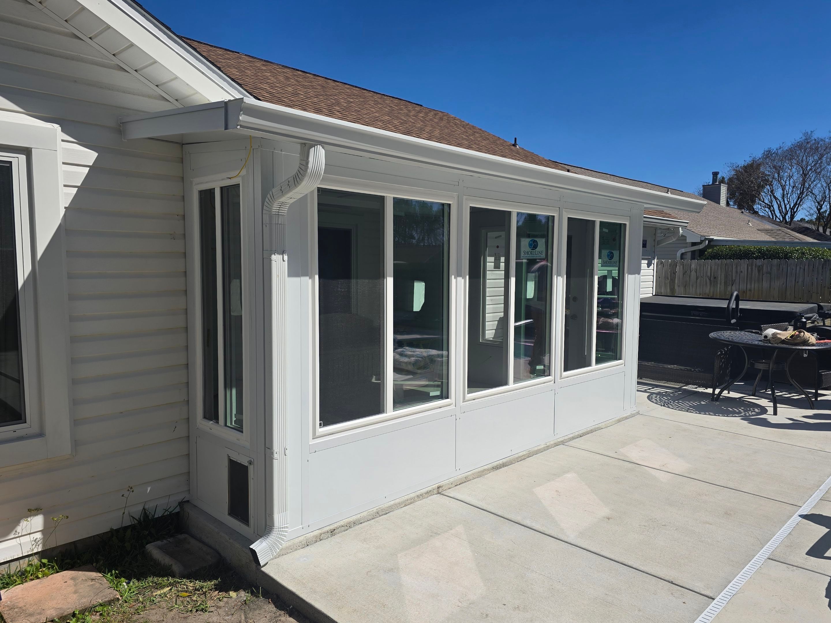 Poolside Glass Room in Gulf Breeze by Titan Sunrooms