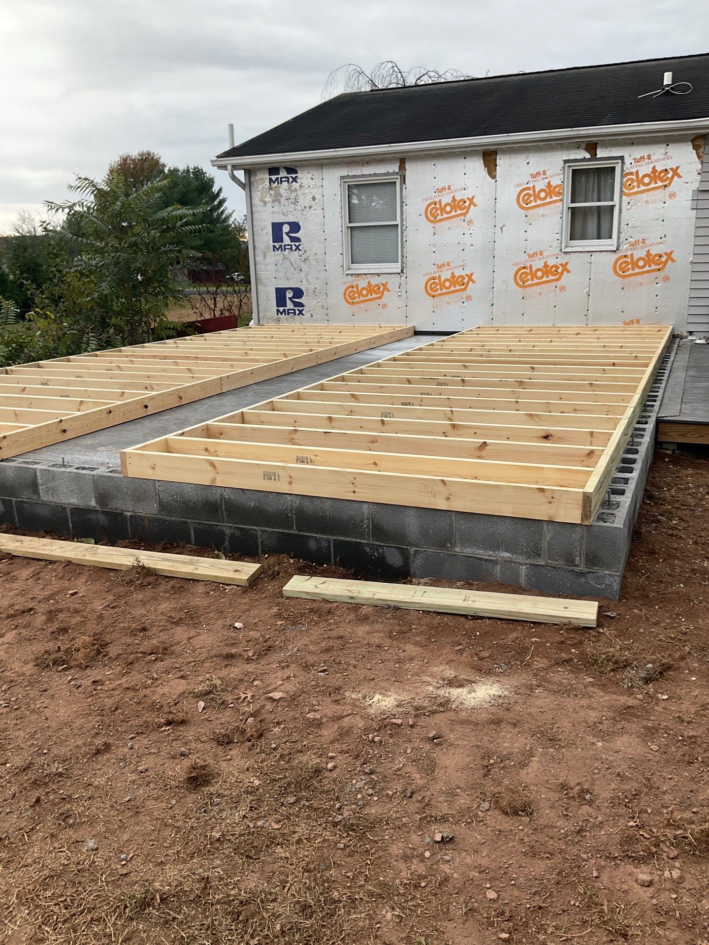 Residential Addition and Covered Porch Roof  by Esh Builders