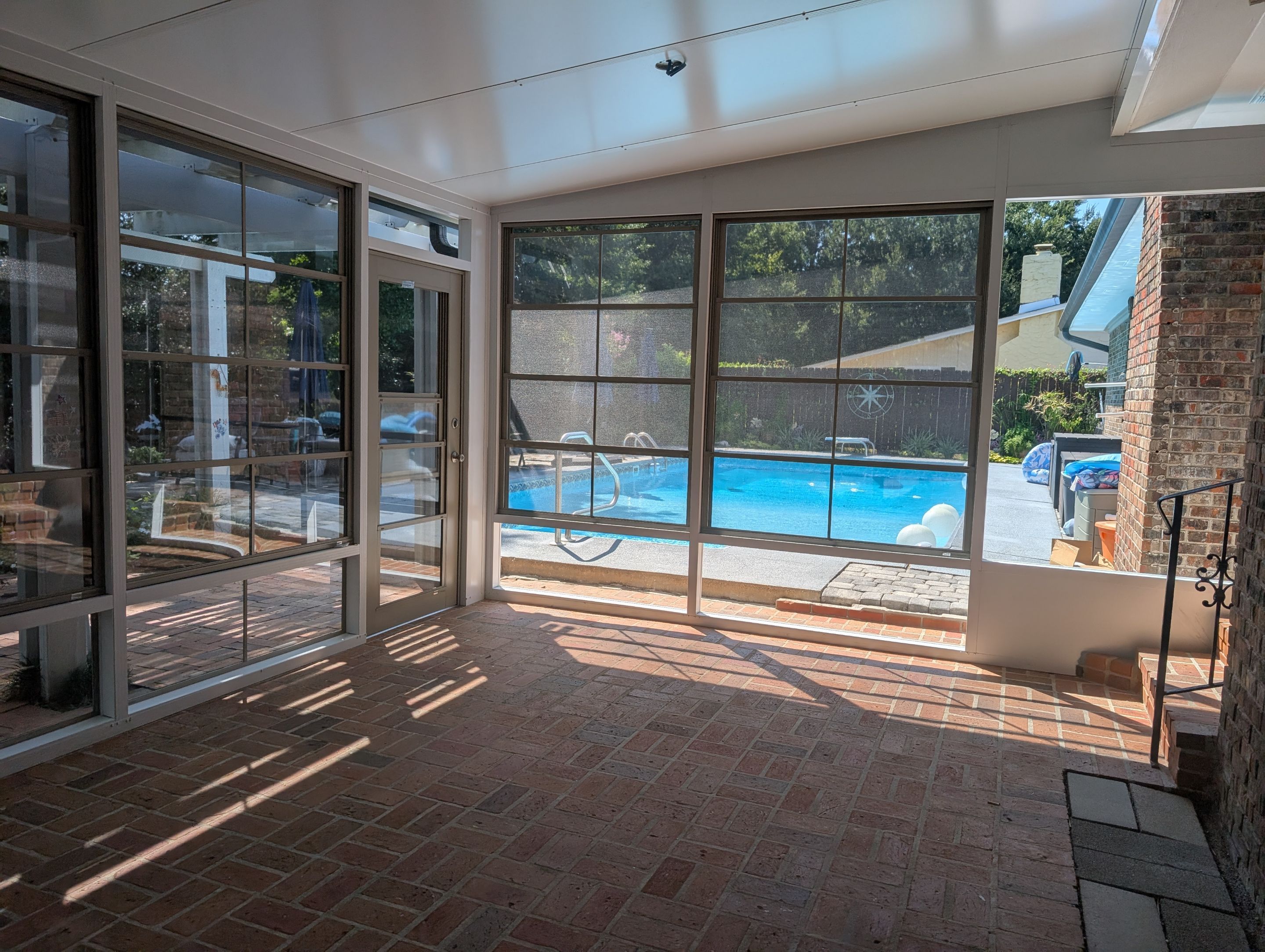 Pensacola Screen Room with Vinyl Slliders by Titan Sunrooms