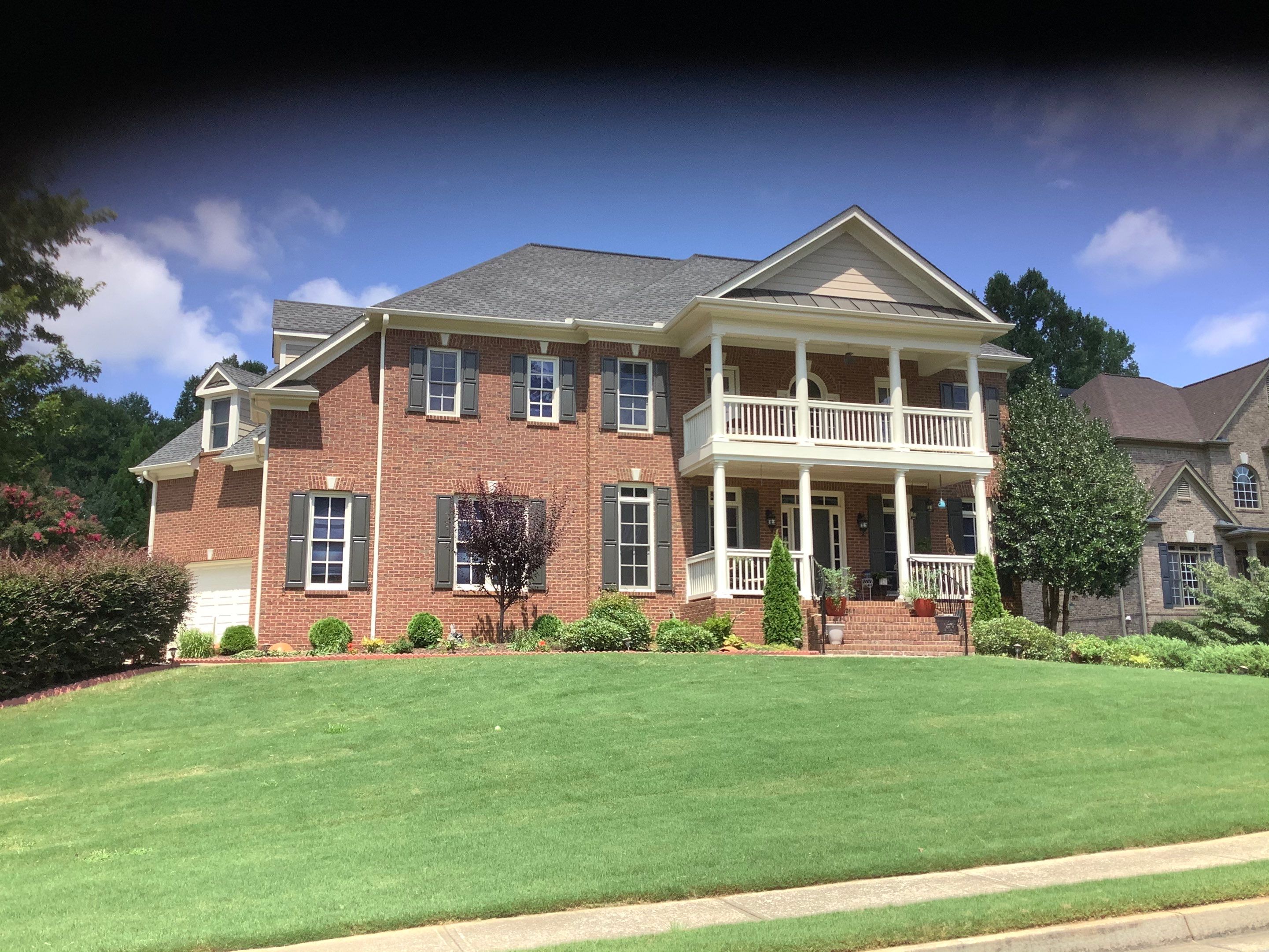 Exterior Trim and Siding Painting for Cumming Red Brick Home by Swift Home Renovations