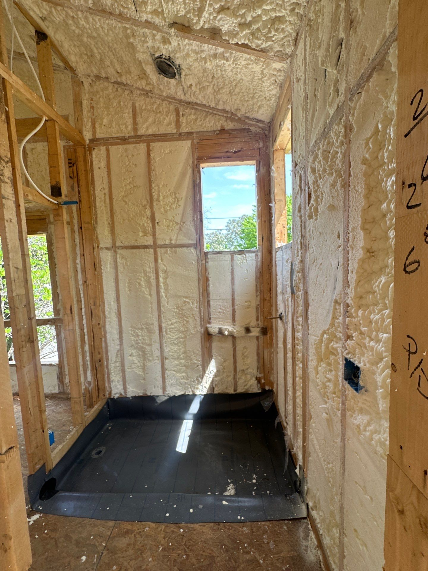 Full encapsulation with open cell spray foam on this custom home in Dallas by Apex Insulation Solutions