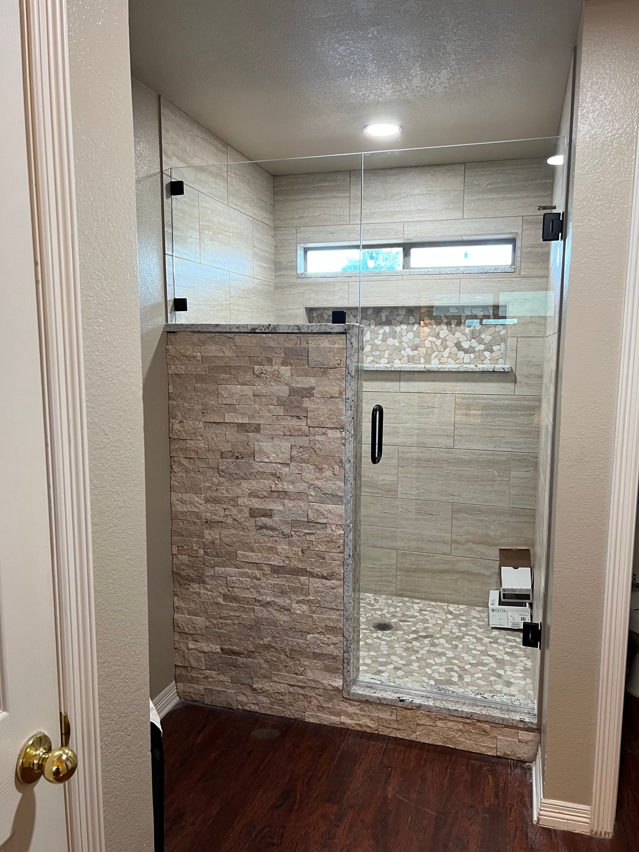Bathroom Shower Remodel for a client by First United Roofing & Construction