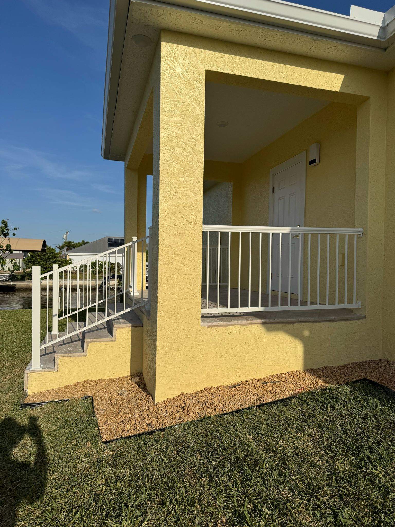 Vinyl Privacy Fence and Porch Railing Installation in Port Charlotte by True Fence LLC