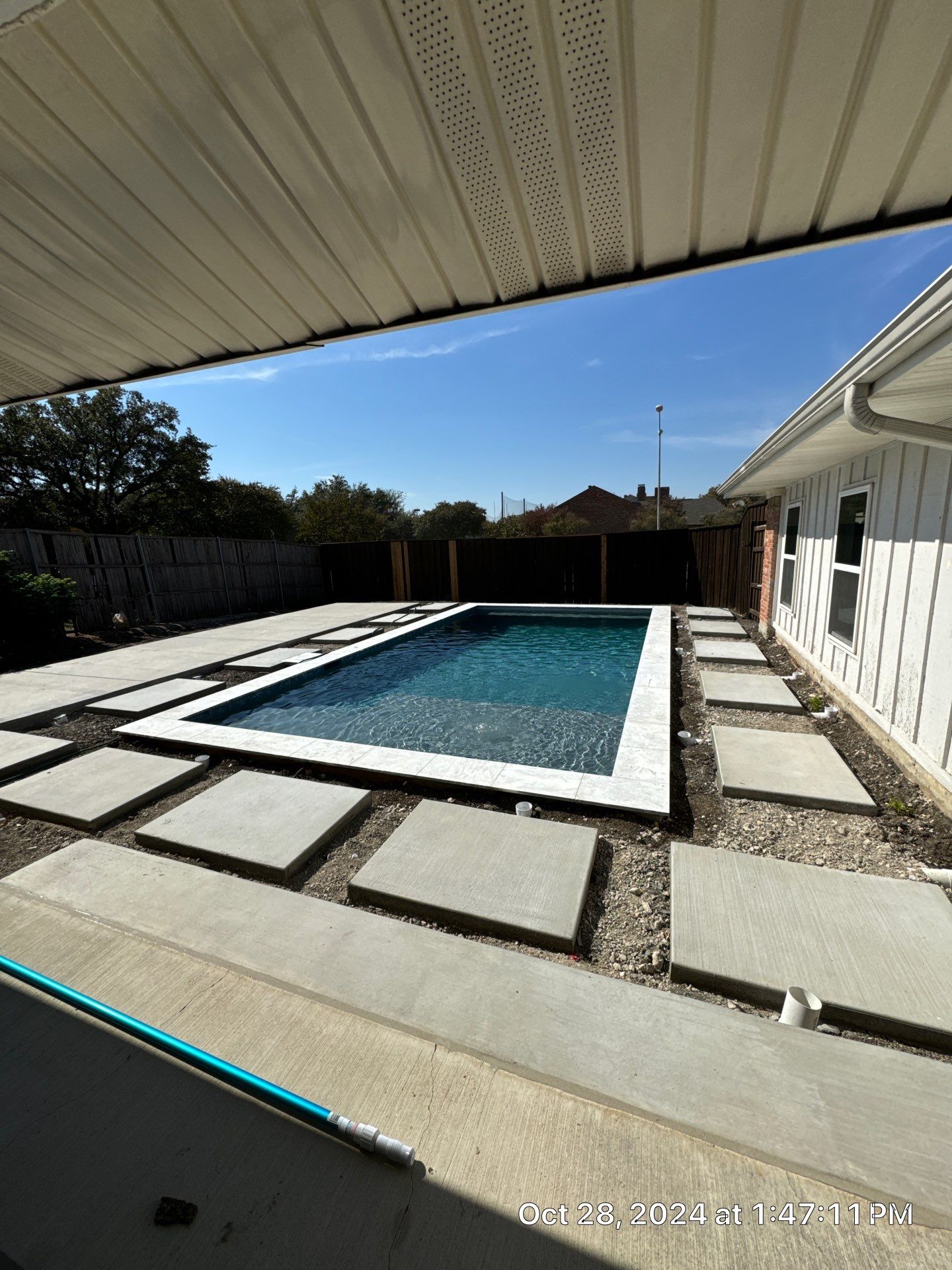 Classic Geometric Pool with Expansive Concrete Deck by Pinnacle Pools and Spas - DFW