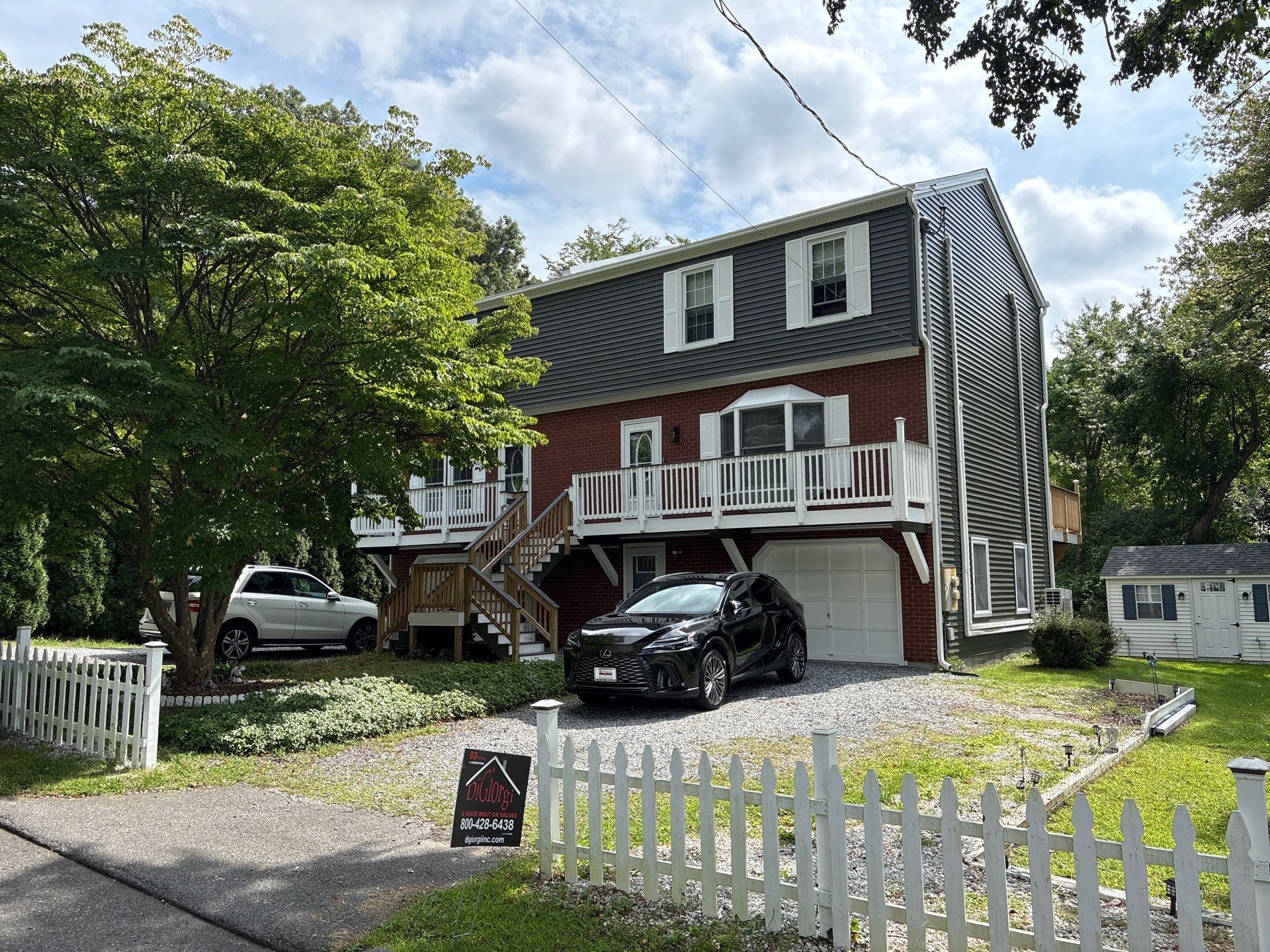 Siding Renewal Using Provia Cedar Peaks D 4.5 in Woodgrain and Tando Brick Panels by DiGiorgi Roofing and Siding Inc