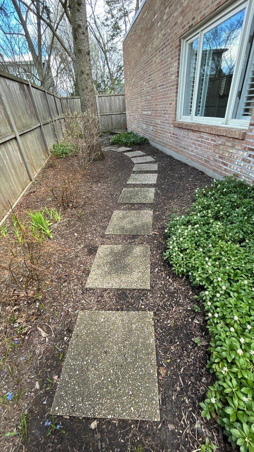 Flagstone stepper cleaning by Northern Power Washing LLC.