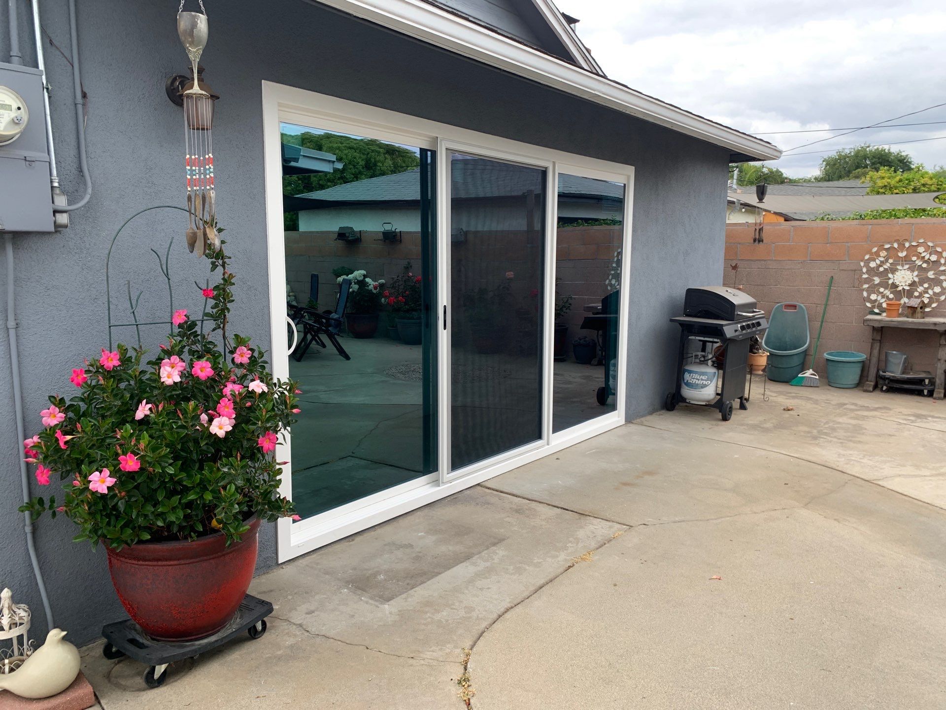 Patio door installation using Amsco Studio Series Vinyl by American Window Company
