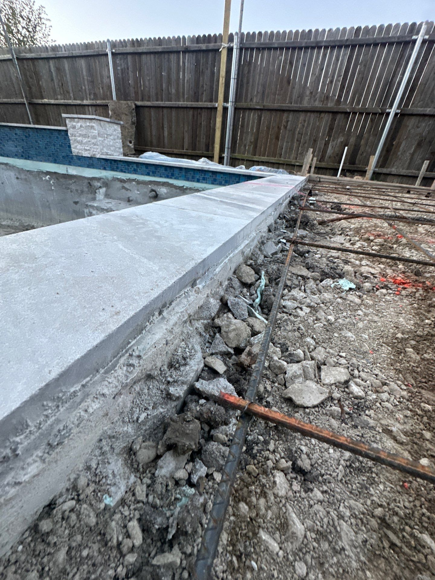 Geometric Pool with Raised Fountain Wall by Pinnacle Pools and Spas - DFW
