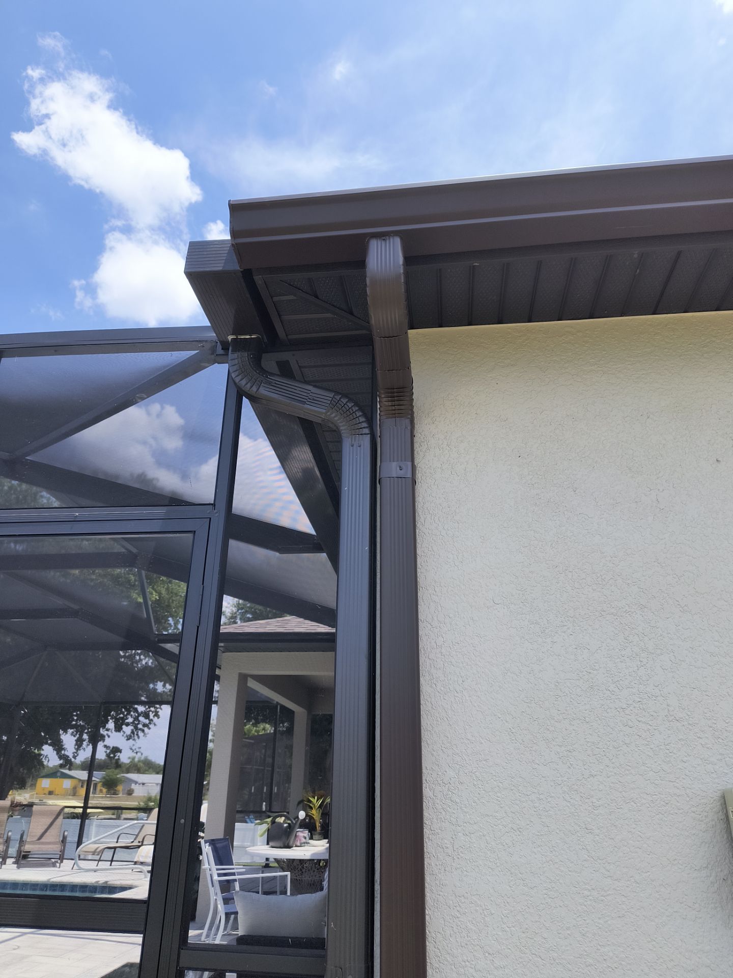 Custom Seamless Gutters and Downspouts for Large Homes in Tampa FL by Gutter Professor by Gutter Professors