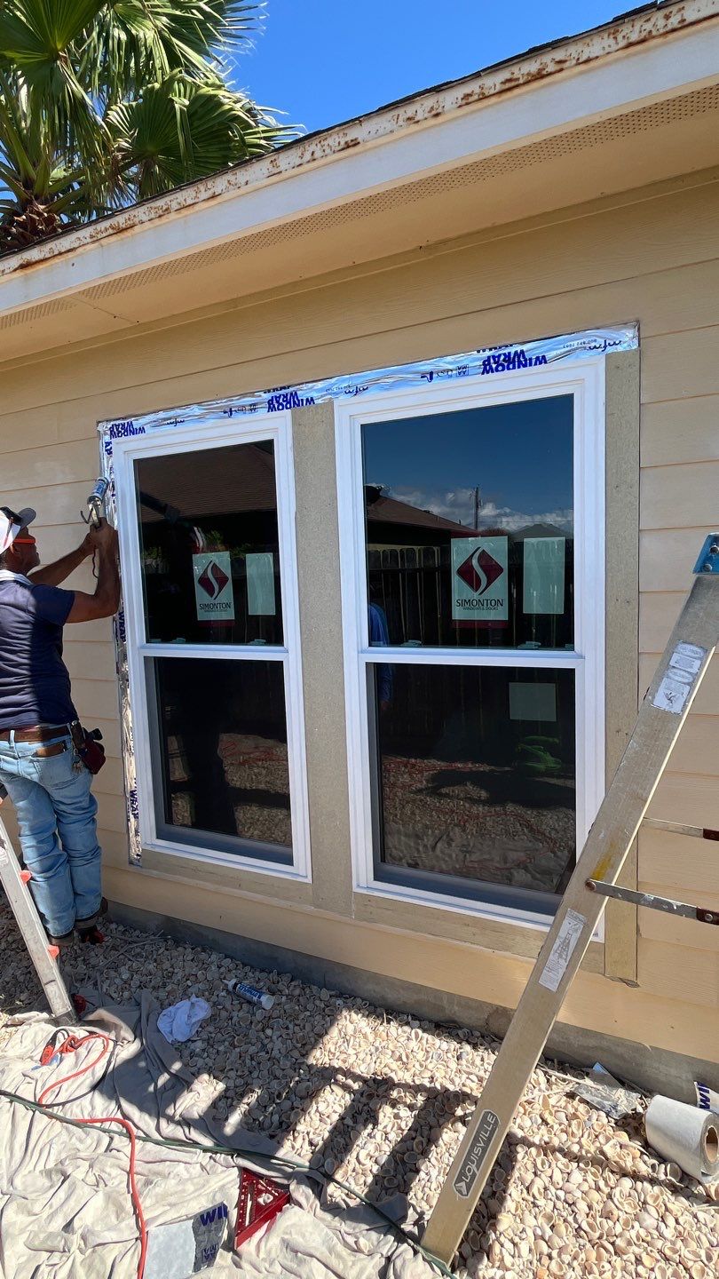 Curved Trim Windows by Bayfront Roofing and Construction