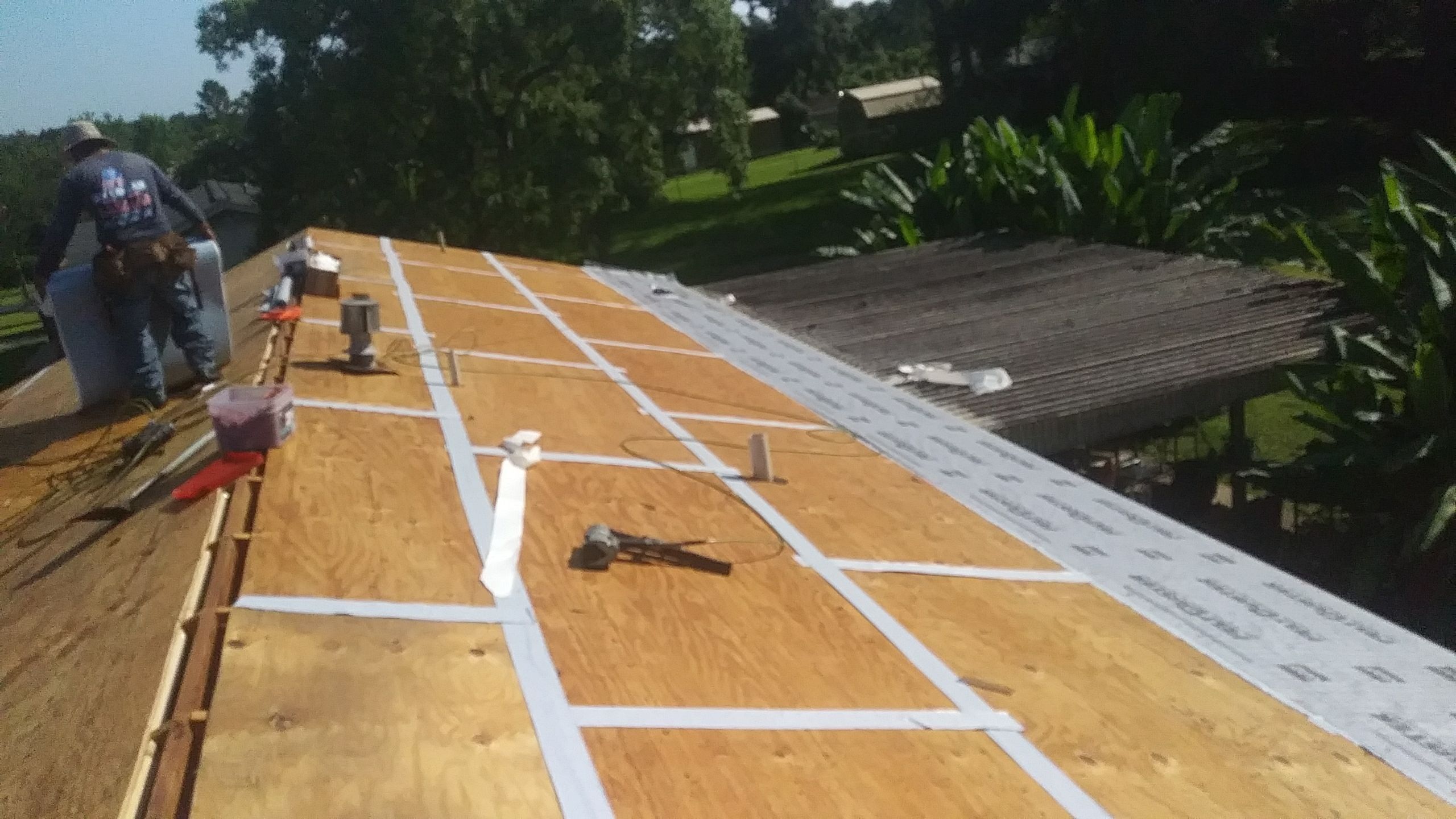 Residential Roofing Installation using Roof Replacement by American Roofing & Construction LLC