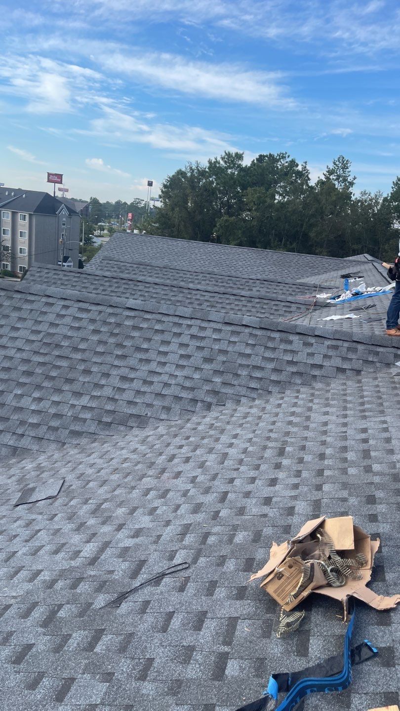 Commercial Roofing Installation using Roof Replacement by American Roofing & Construction LLC