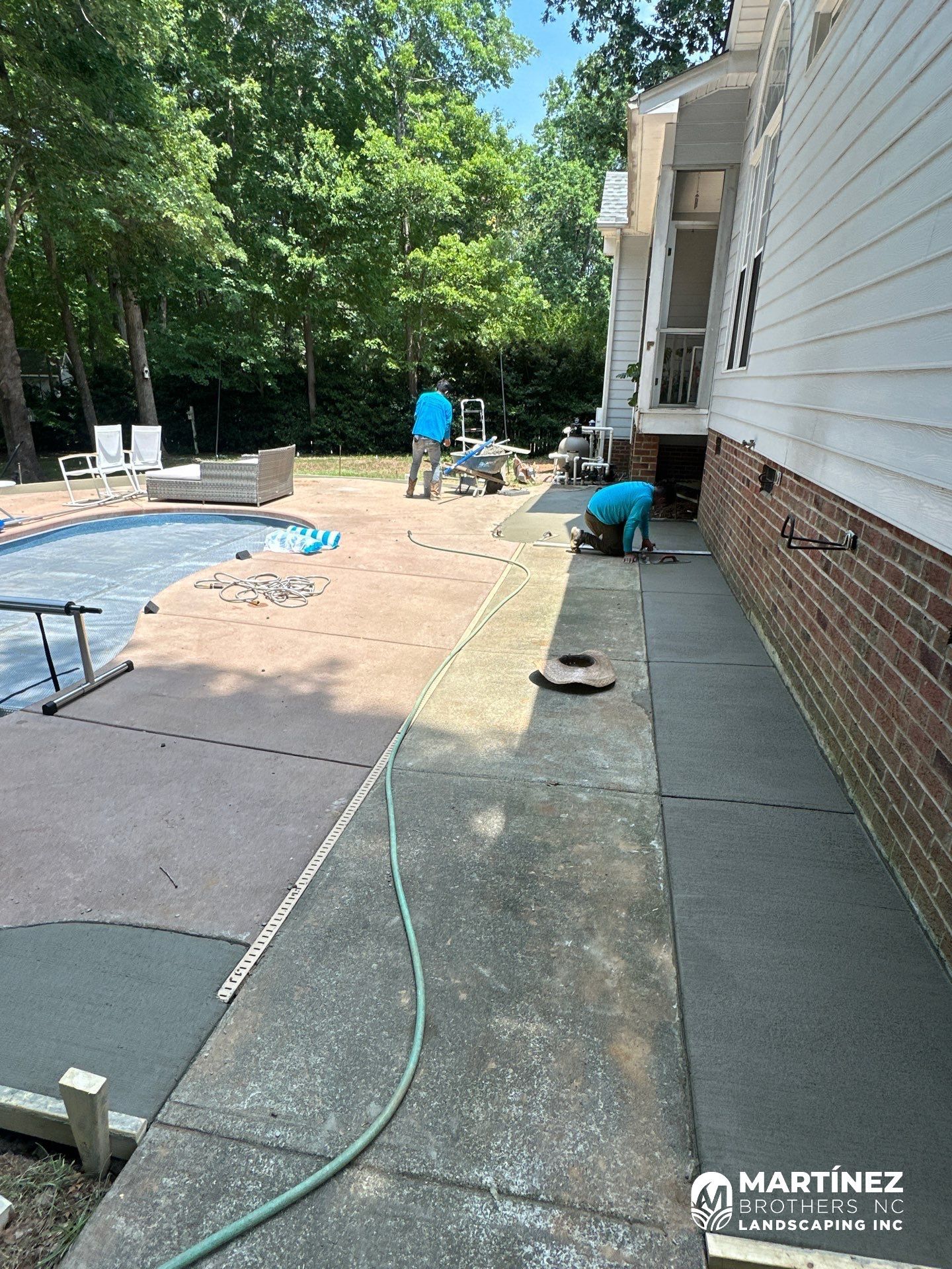 Cool decking pool in Youngsville by Martinez Brother’s Nc Landscaping Inc