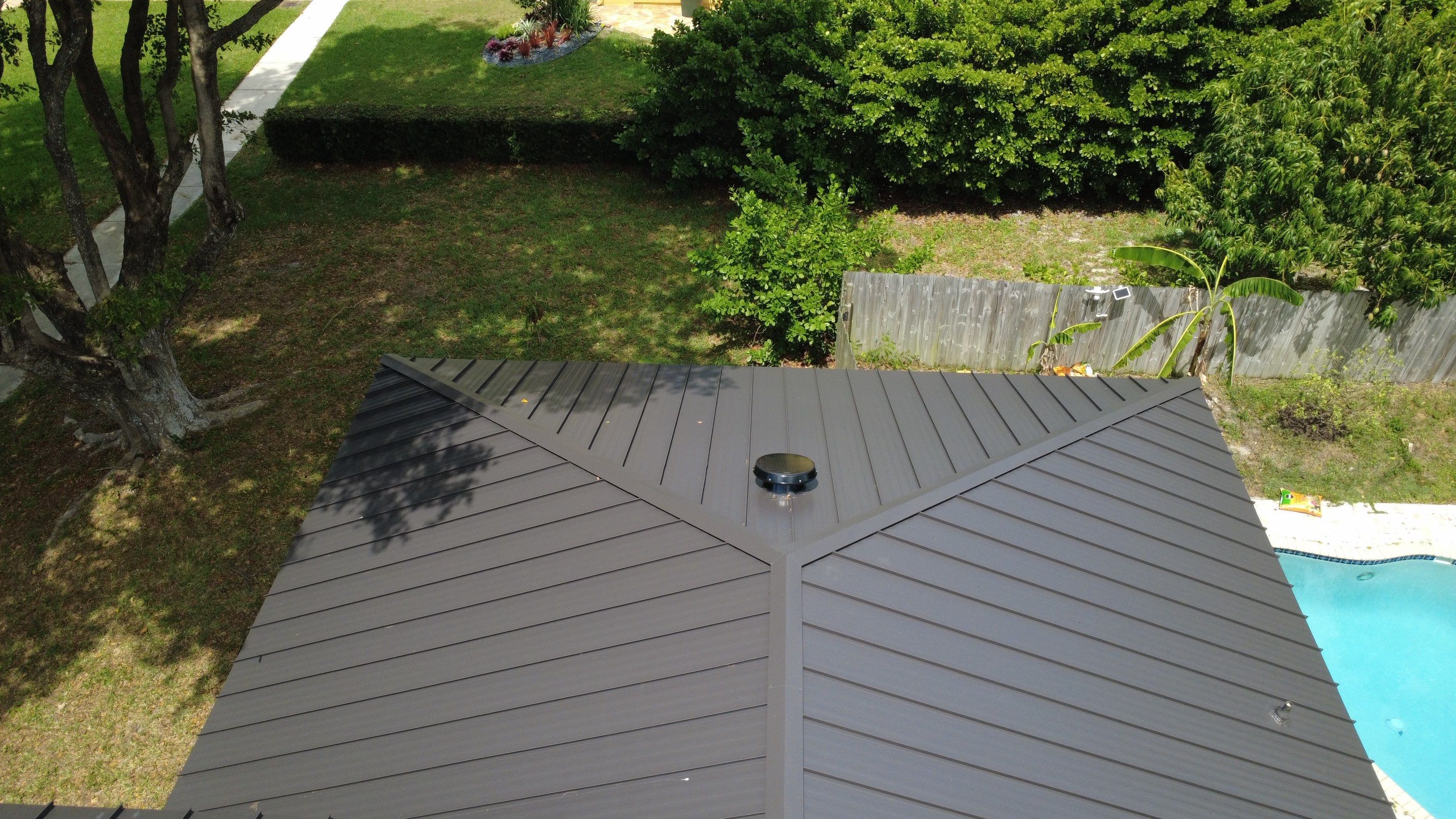 Residential Roofing Installation using 1.5'' Mechanical Seam by BLUES BROTHERS ROOFING