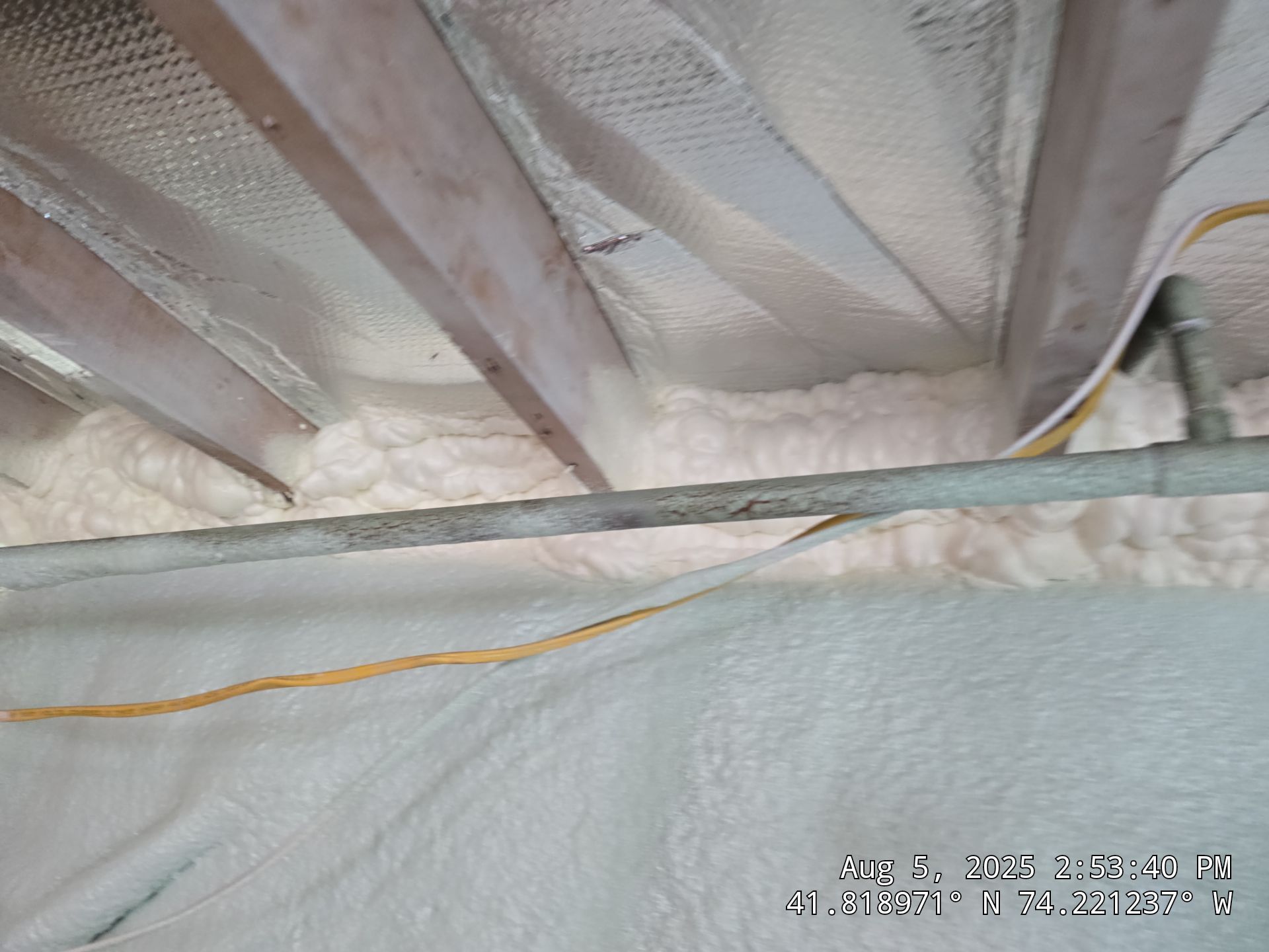 Master bedroom Exterior Walls using open cell spray foam by NYS Foam & Energy