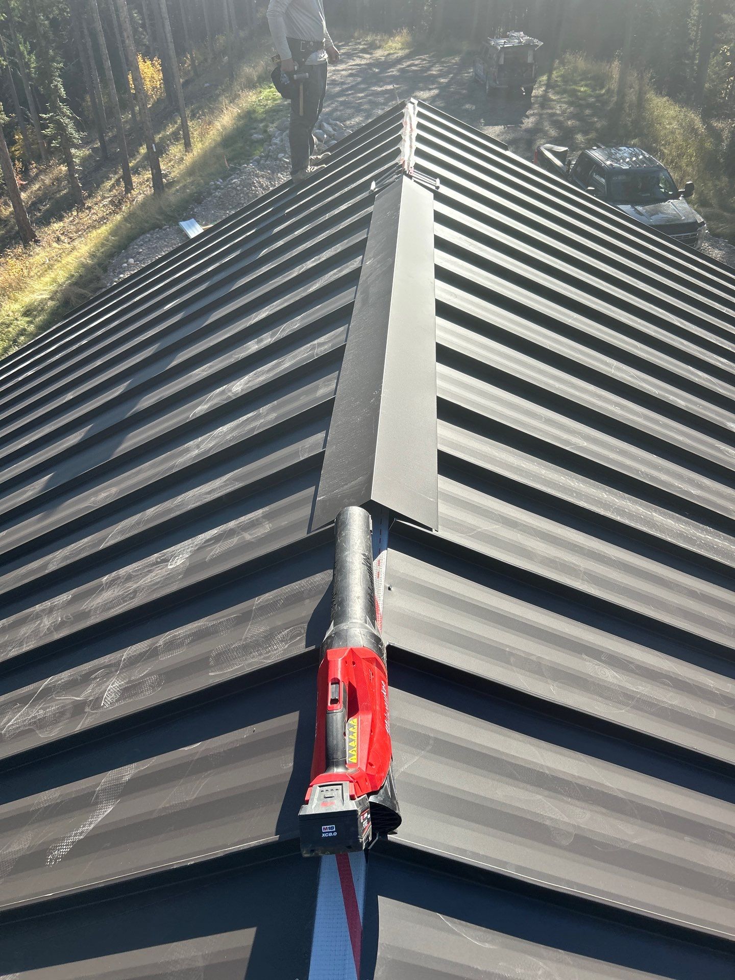 Mechanical Lock Standing Seam - CMG ULG Dark Bronze  by Montana Roofing Solutions