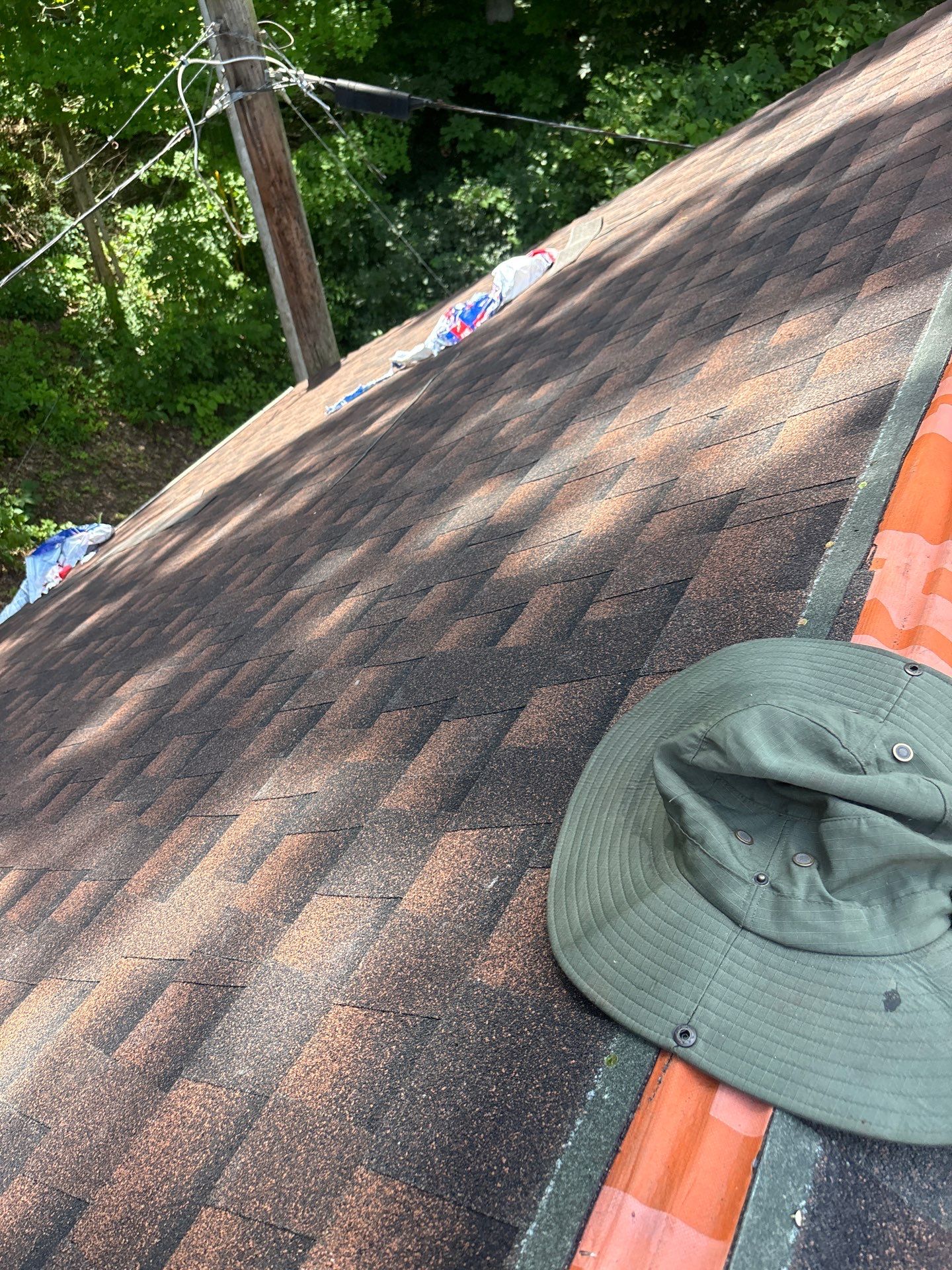 Residential Roofing Installation using GAF TImberline HDZ Hickory by Rainstoppers Roofing