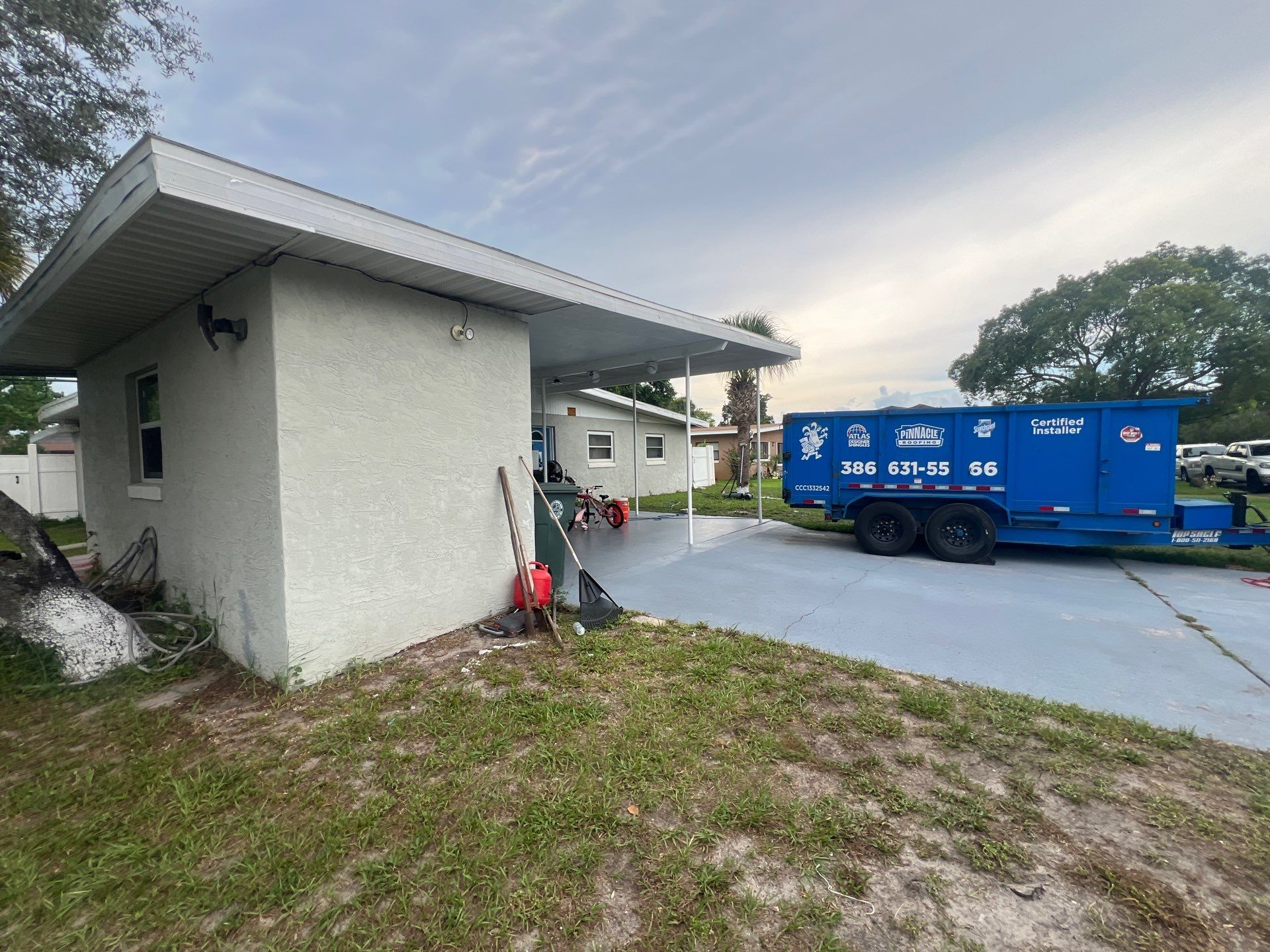Colonial Slate Modified Bitumen Flat Roof Replacement in Daytona Beach by Pinnacle Roofing Group